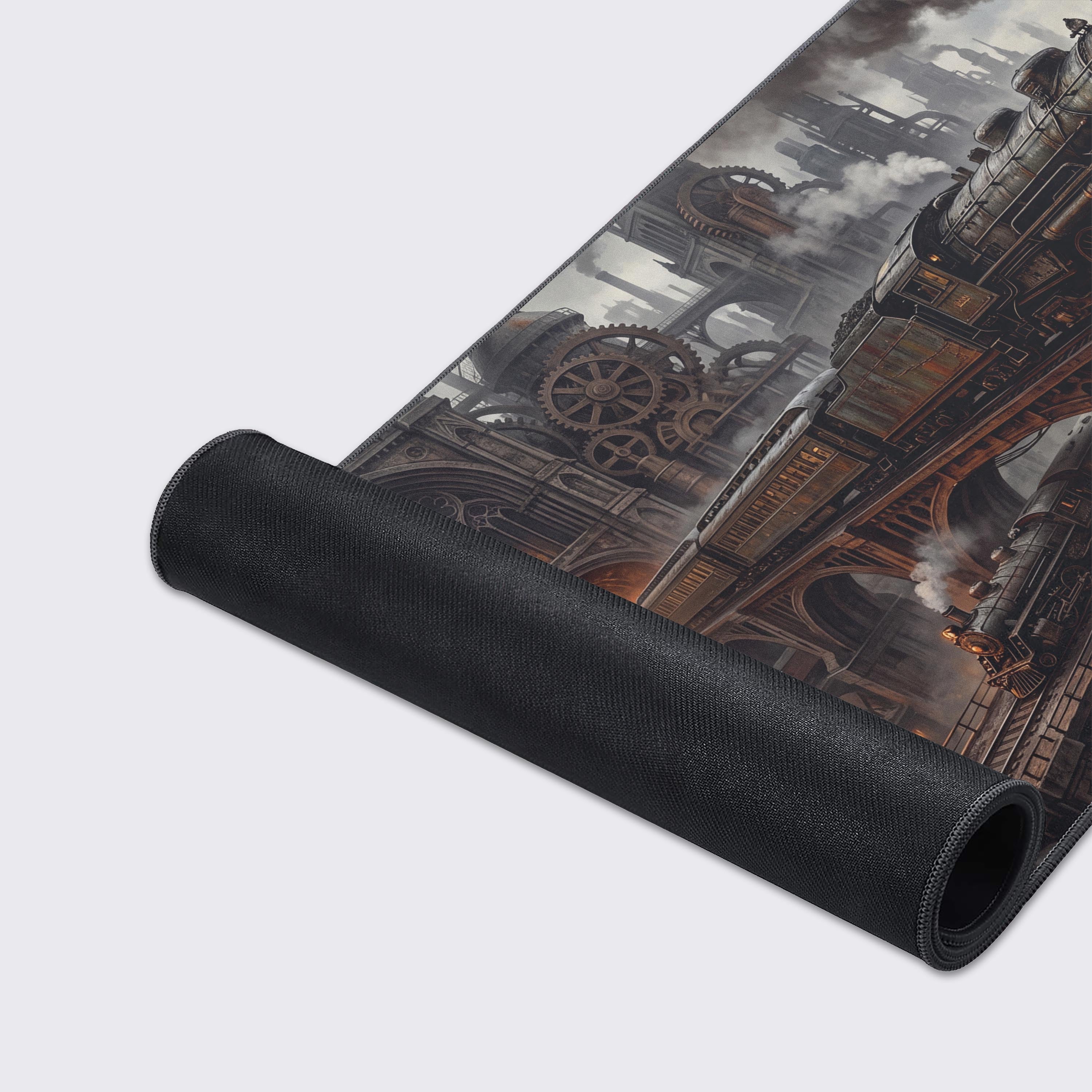 Detailed view of the steam train on the desk mat with bright headlights piercing through thick industrial smoke.