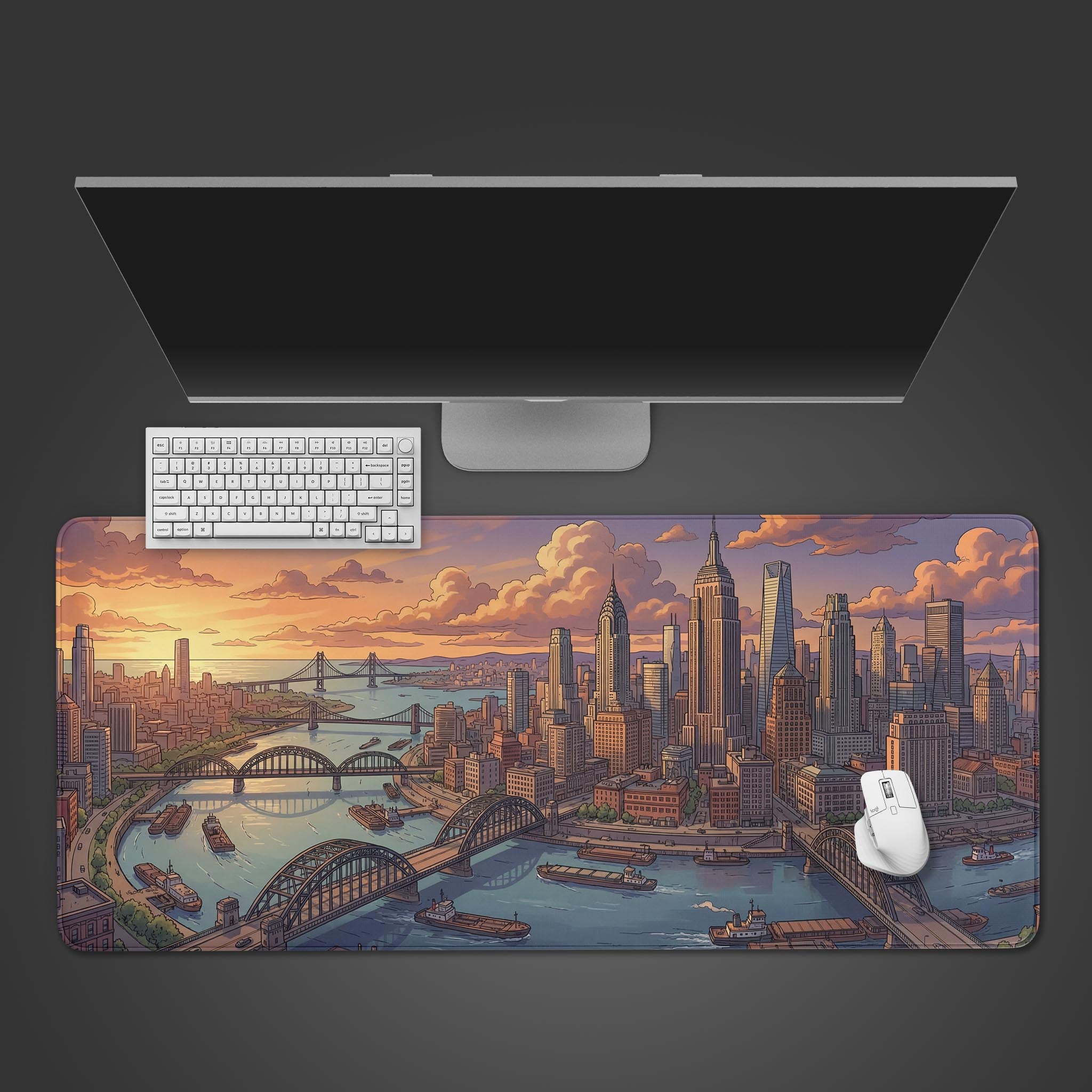A top-down view of the Sunset Commerce gaming desk mat, showing its vibrant New York cityscape design underneath a sleek monitor, keyboard, and mouse. - Epic Design Pads & Mousepads