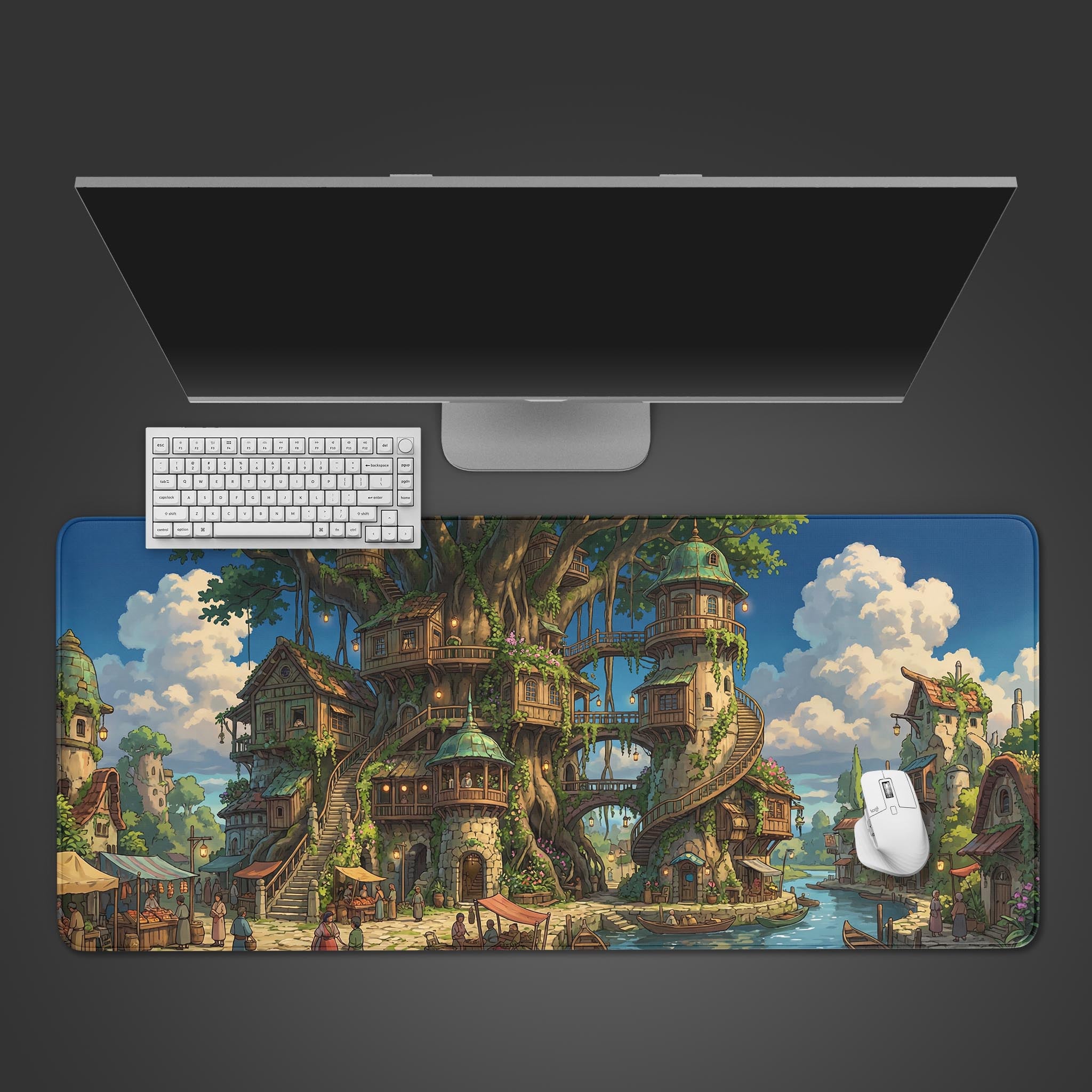 Top-down view of the Sylvan Heights fantasy village Gaming Desk Mat, shown with a white keyboard and mouse on a dark gray surface, highlighting the detailed anime-style artwork. - Epic Design Pads & Mousepads