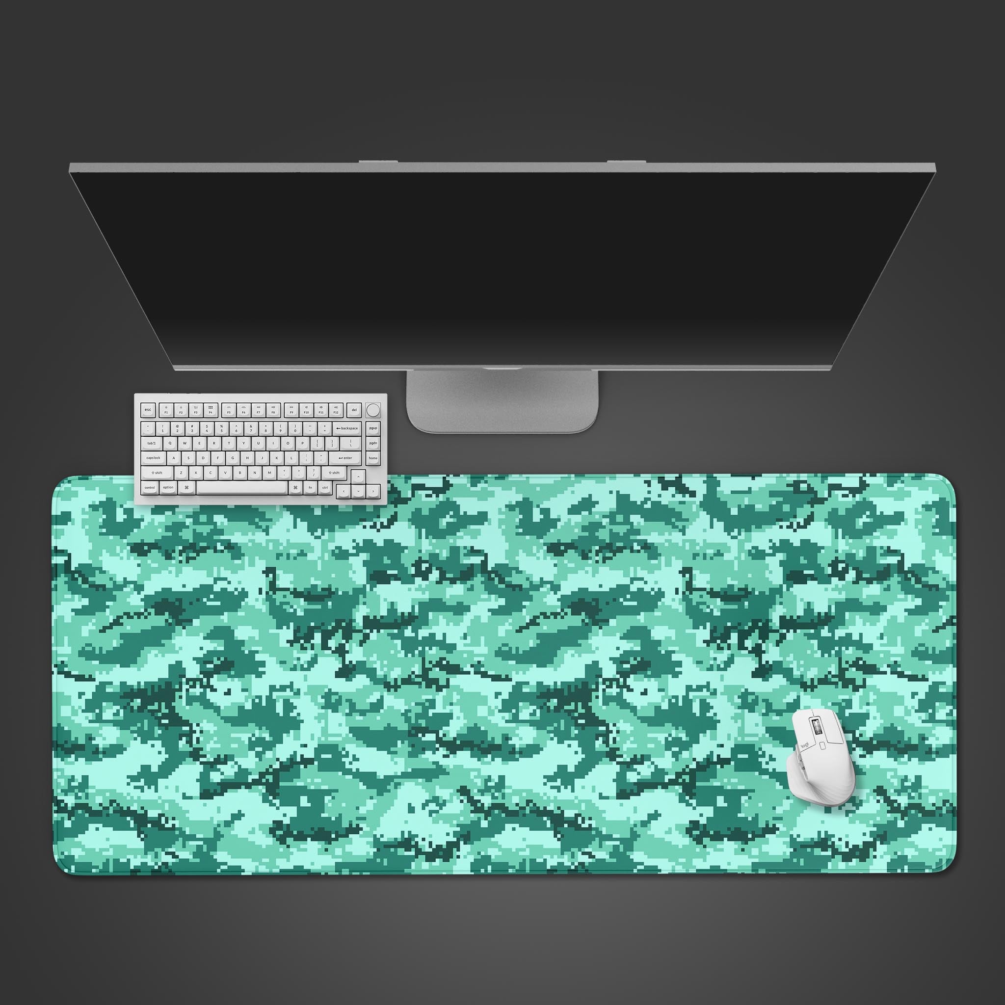 Teal Pixel Camo desk mat in a modern digital pattern, shown from a top-down view with a keyboard and gaming mouse. - Epic Design Pads