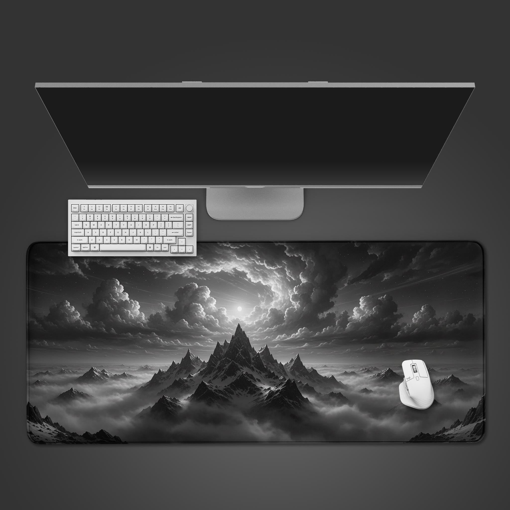 Modern desk mat with monochrome mountain summit design – top view with keyboard and mouse. - Epic Design Pads