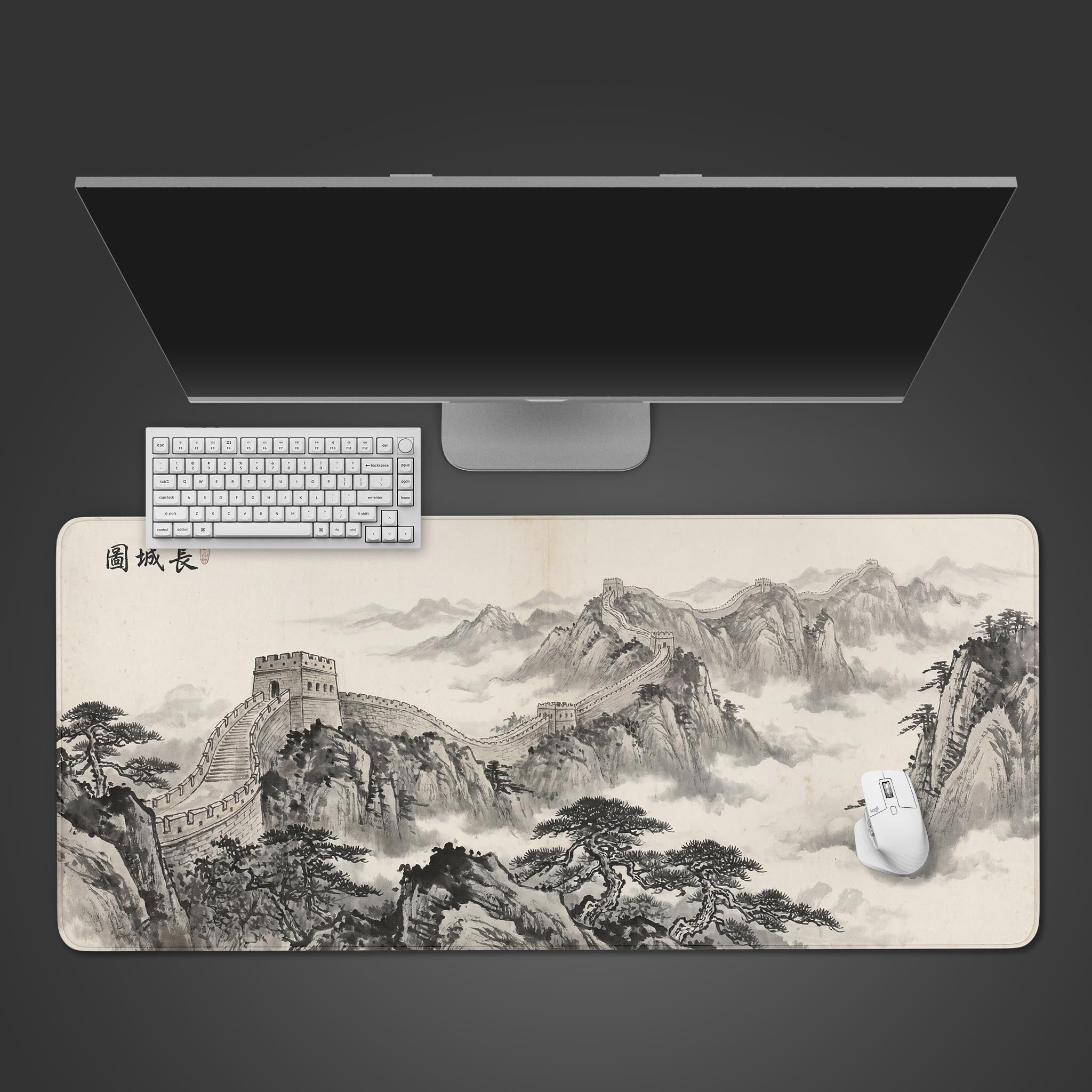 Top-down view of The Great Wall ink wash gaming desk mat, shown with a white keyboard, mouse, and a sleek monitor on a dark grey background. - Epic Design Pads & Mousepads