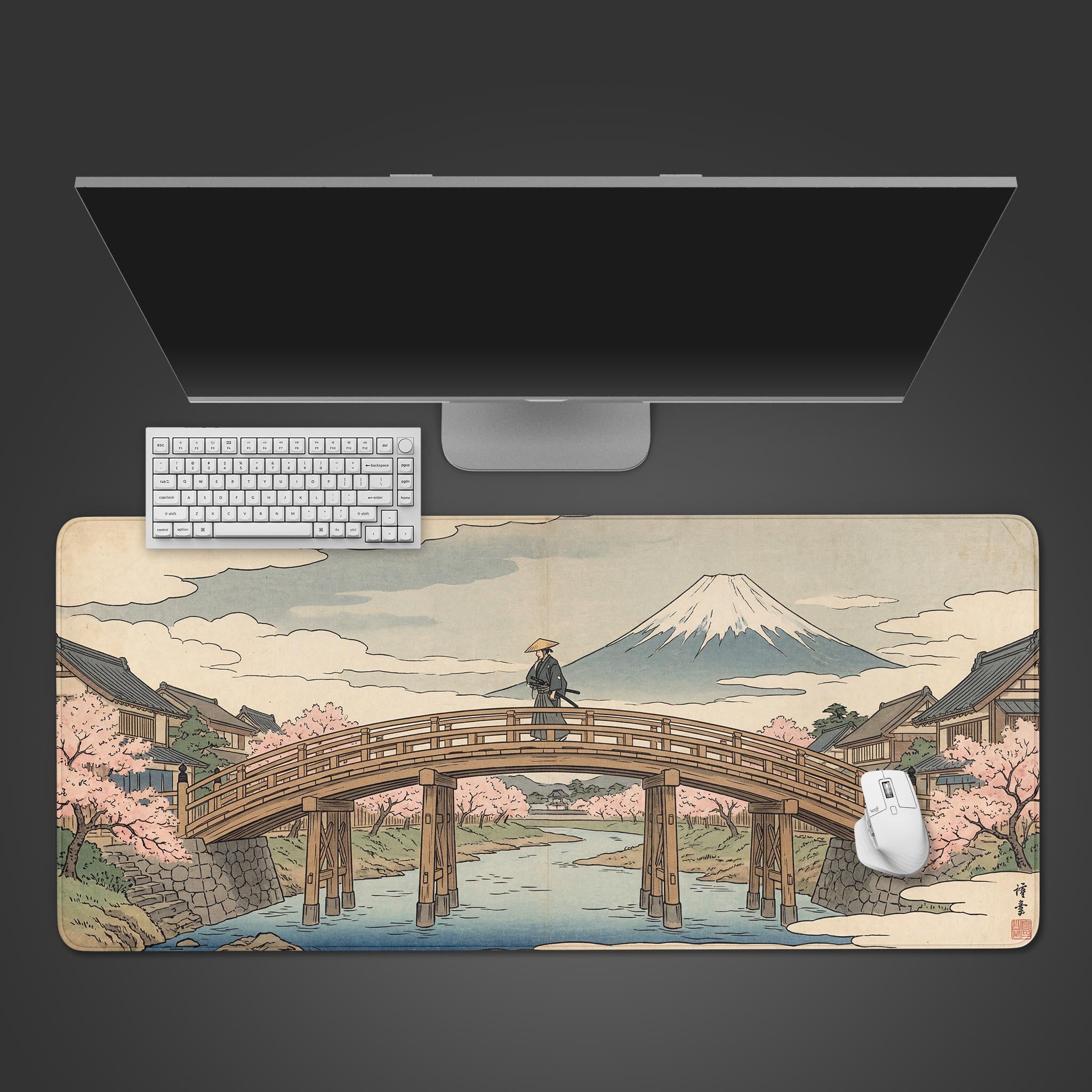 Top-down view of 'The Ronin’s Crossing' gaming desk mat, featuring a Japanese Ukiyo-e art style, shown with a white keyboard and mouse on a dark surface. - Epic Design Pads & Mousepads