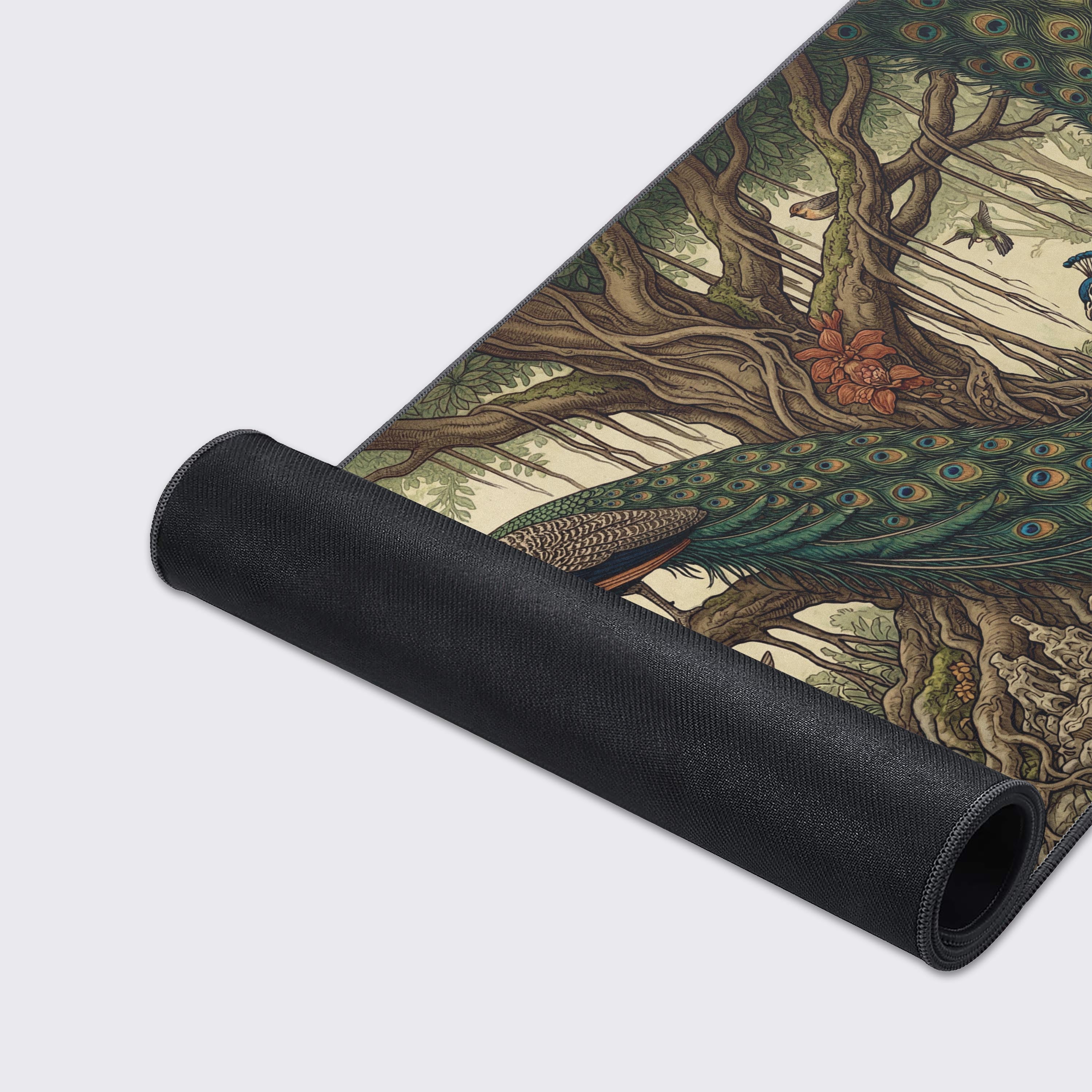 Detailed view of the pomegranate fruits and small hummingbirds in the botanical desk mat design.