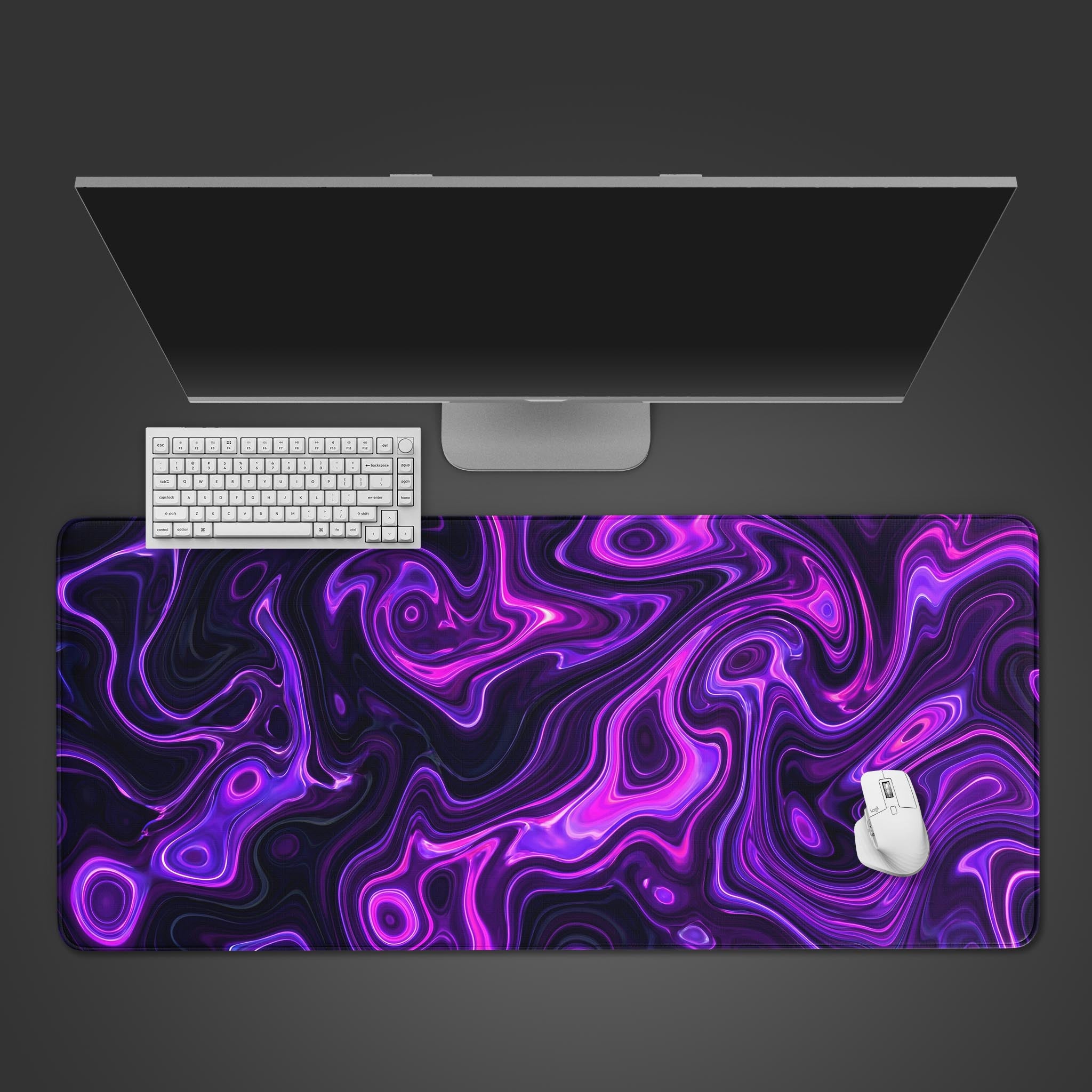 Top-down view of the Violet Flux gaming desk mat, featuring a vibrant purple liquid swirl design, with a white keyboard and mouse on a dark background. - Epic Design Pads & Mousepads