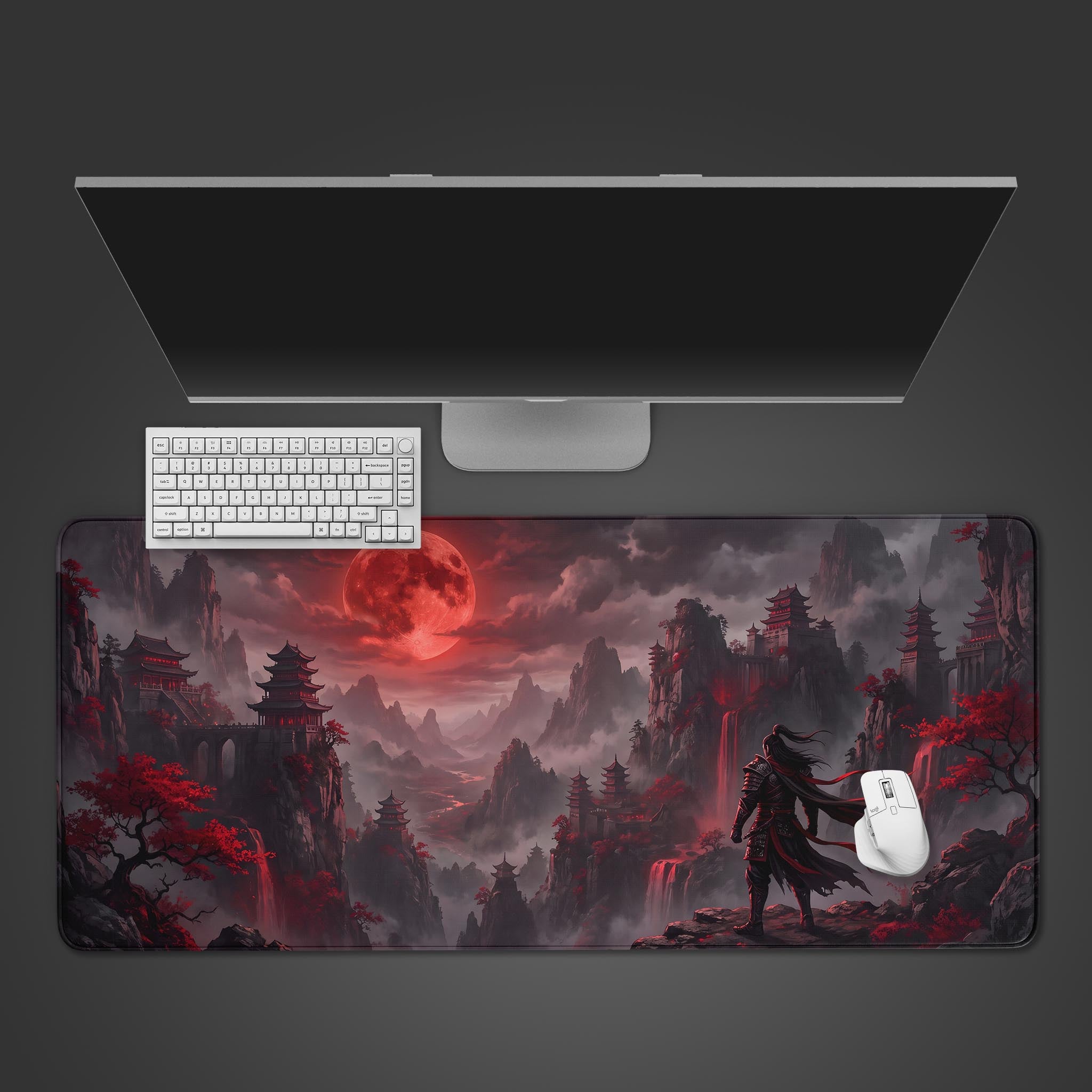 A desk mat featuring a dark fantasy warrior looking over a misty mountain valley under a blood red moon.