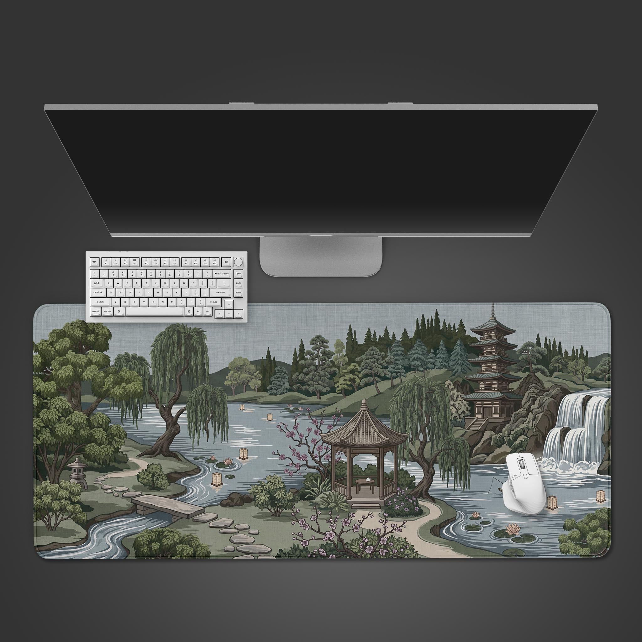 Top-down view of the Zen Garden Escape gaming desk mat, featuring a Japanese landscape with a pagoda. A white keyboard and mouse are shown on the mat. - Epic Design Pads & Mousepads