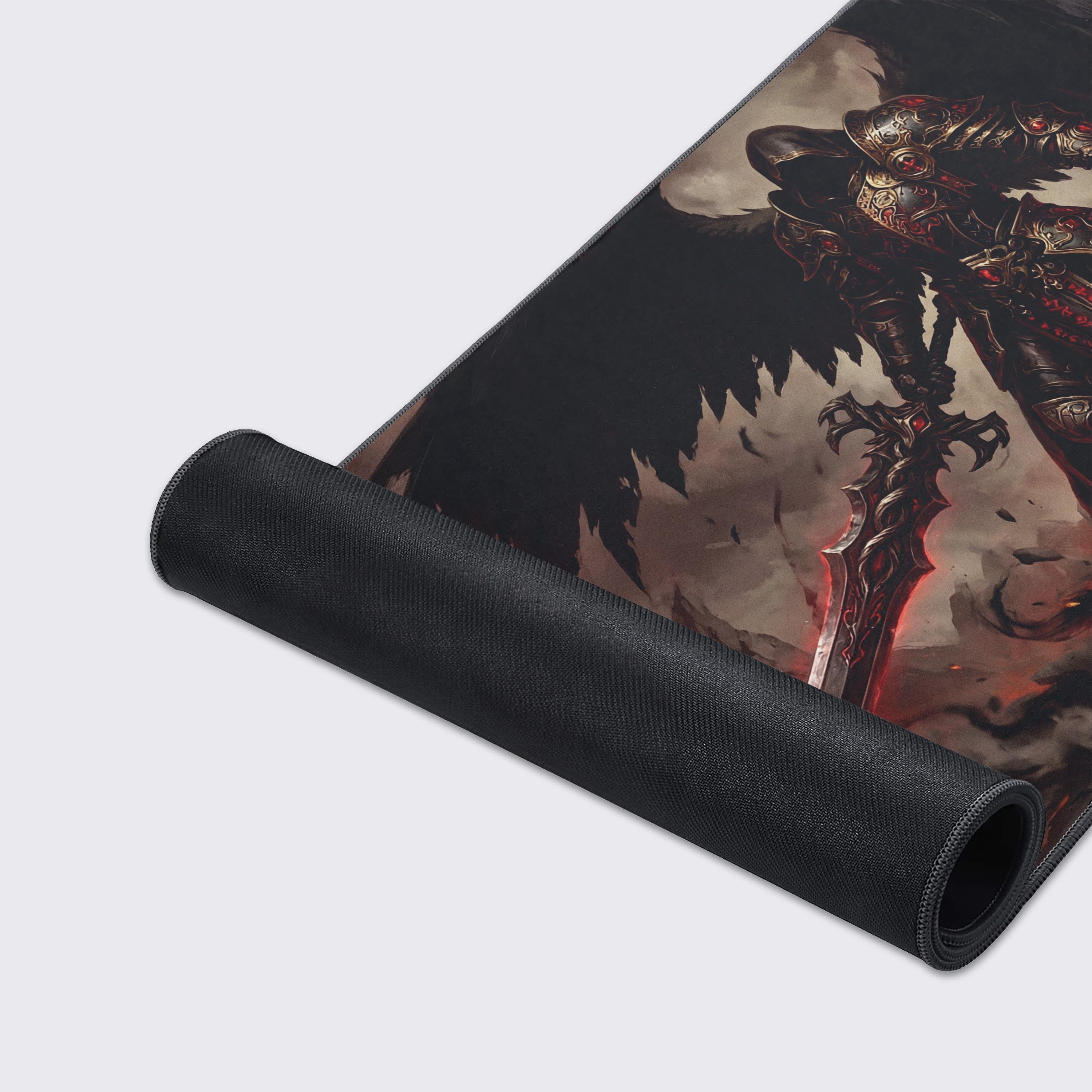Close-up of the Fallen Angel gaming desk mat, highlighting the high-quality fabric texture and durable stitched edges of the intricate winged warrior design. - Epic Design Pads & Mousepads