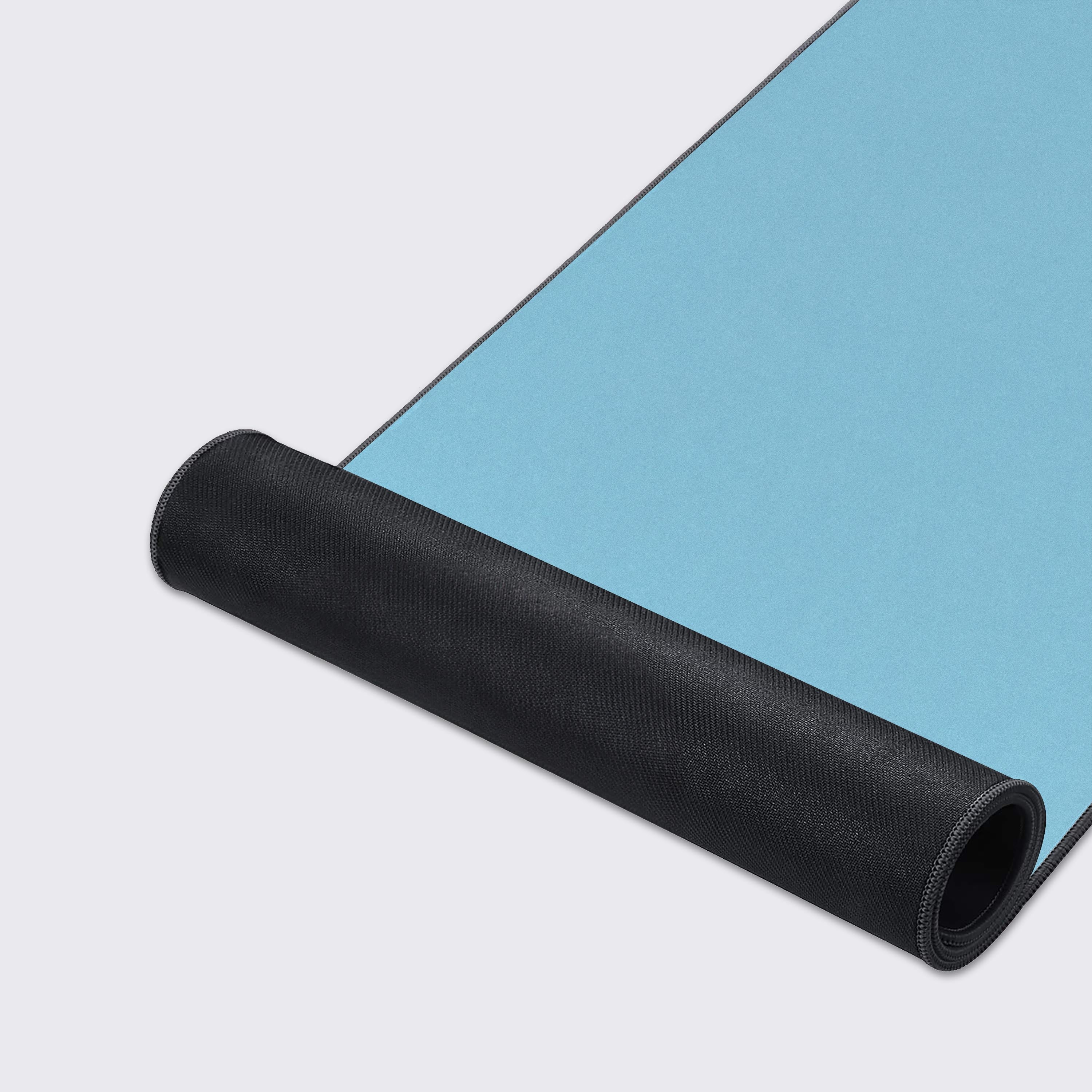 A close-up of the 'Stay Afloat' mouse pad's smooth texture and durable stitched edges, showcasing the cute black cat design in the corner. - Epic Design Pads & Mousepads