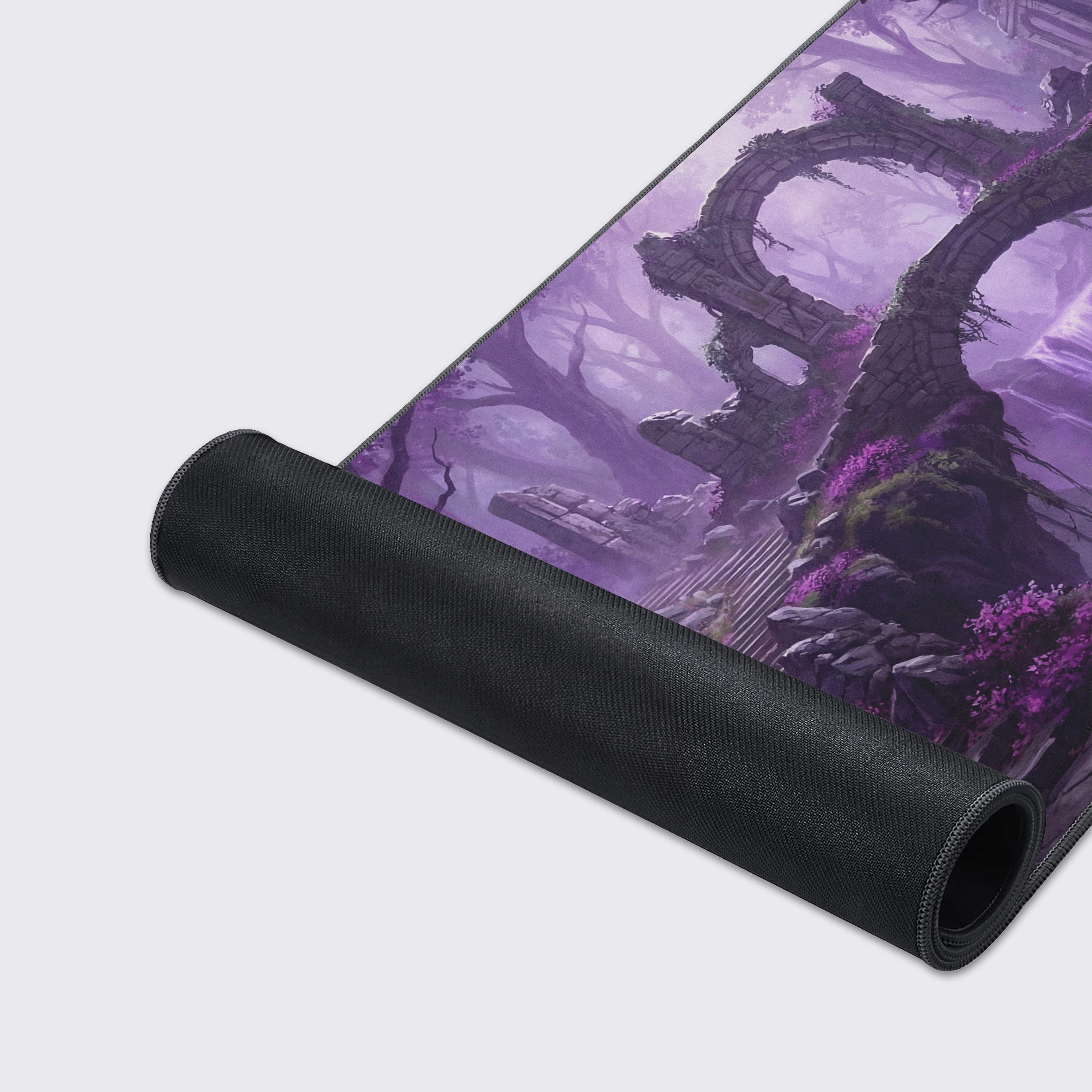 A close-up of the Violet Ruins mouse pad, highlighting the detailed artwork of the enchanted forest and its durable, anti-fray stitched edges for longevity. - Epic Design Pads & Mousepads