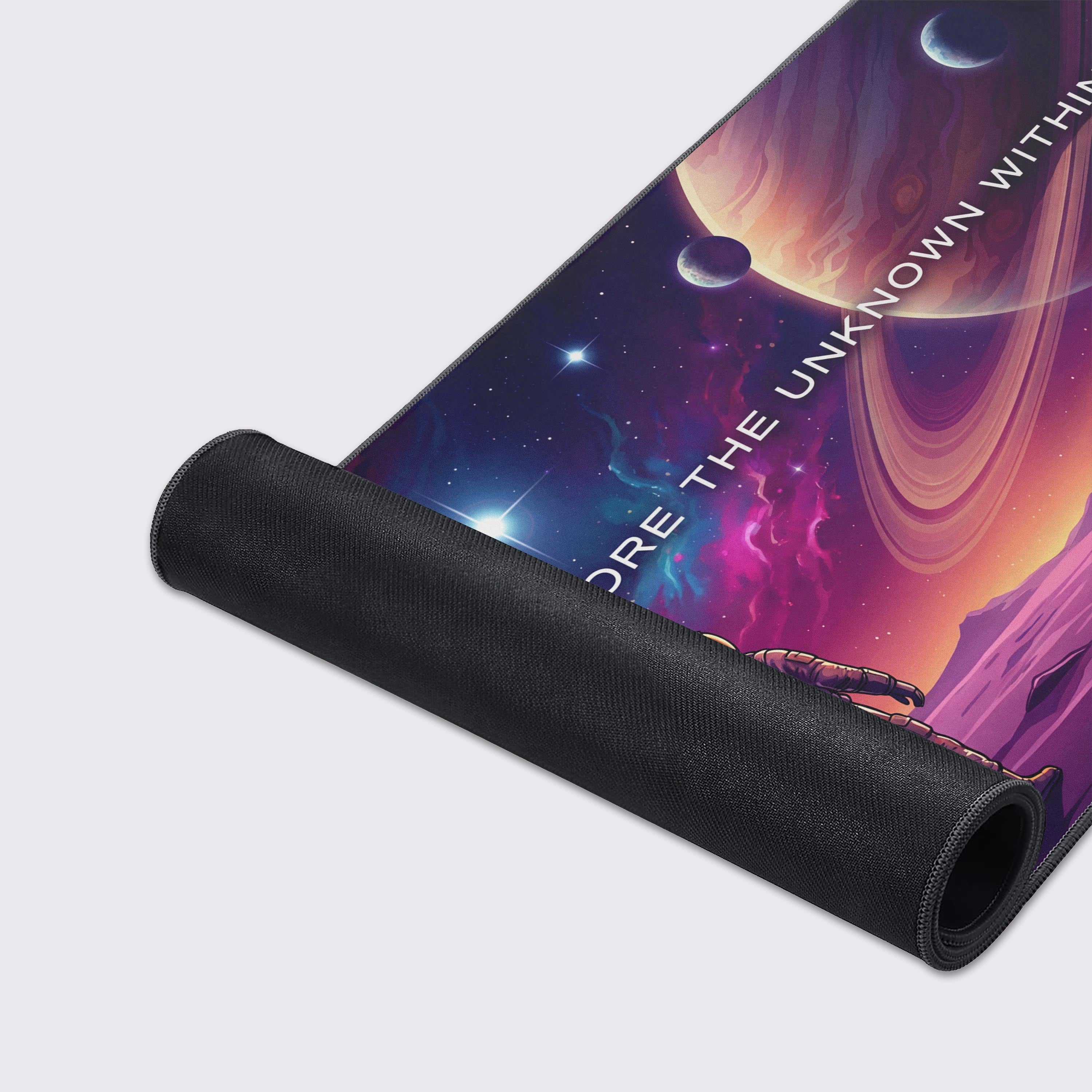 A close-up of the "Explore The Unknown Within" mouse pad, highlighting its smooth texture, durable stitched edges, and vibrant sci-fi artwork. - Epic Design Pads & Mousepads