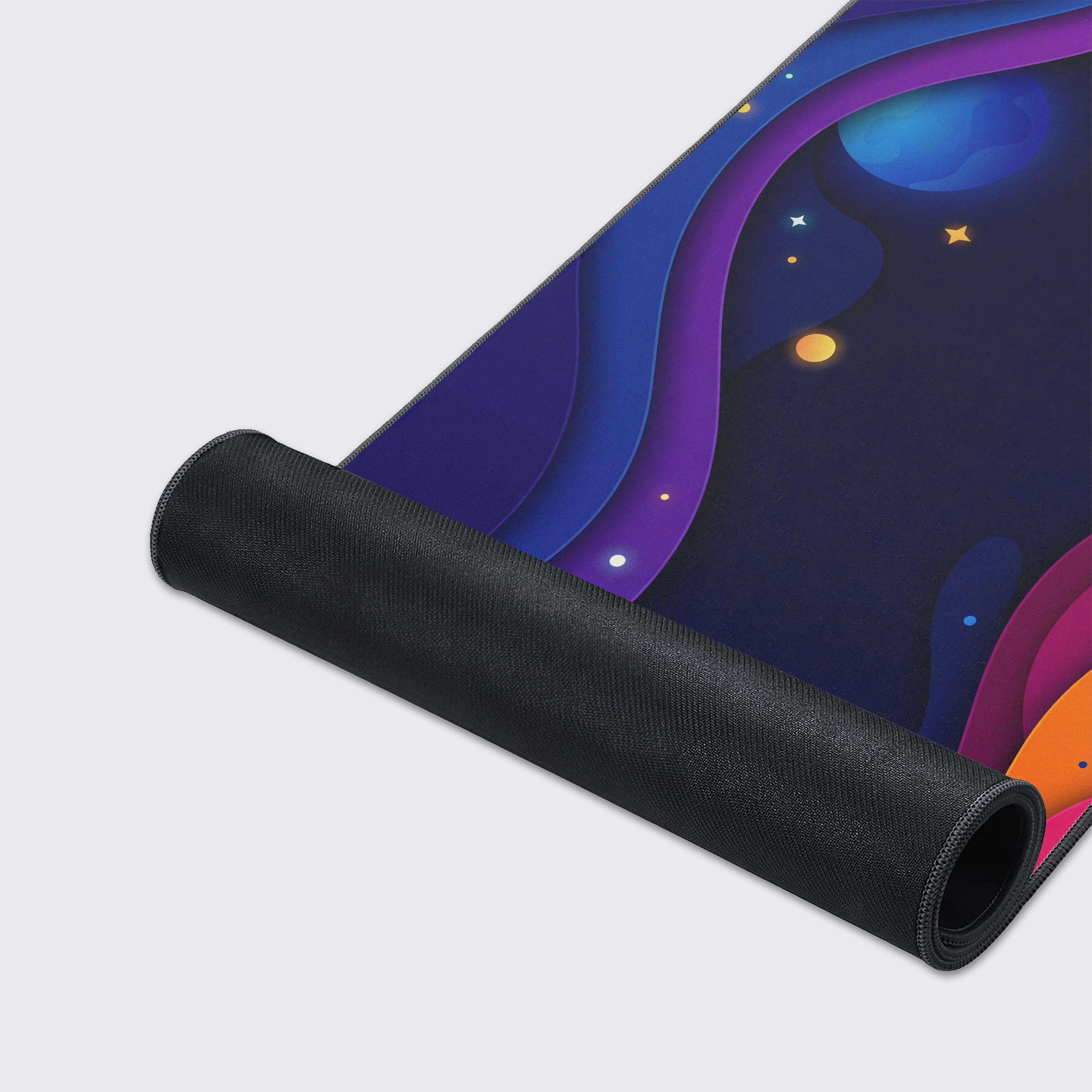 Close-up of the Stellar Drift gaming desk mat, highlighting the smooth fabric texture, stitched edges, and vibrant layered galaxy artwork. - Epic Design Pads & Mousepads