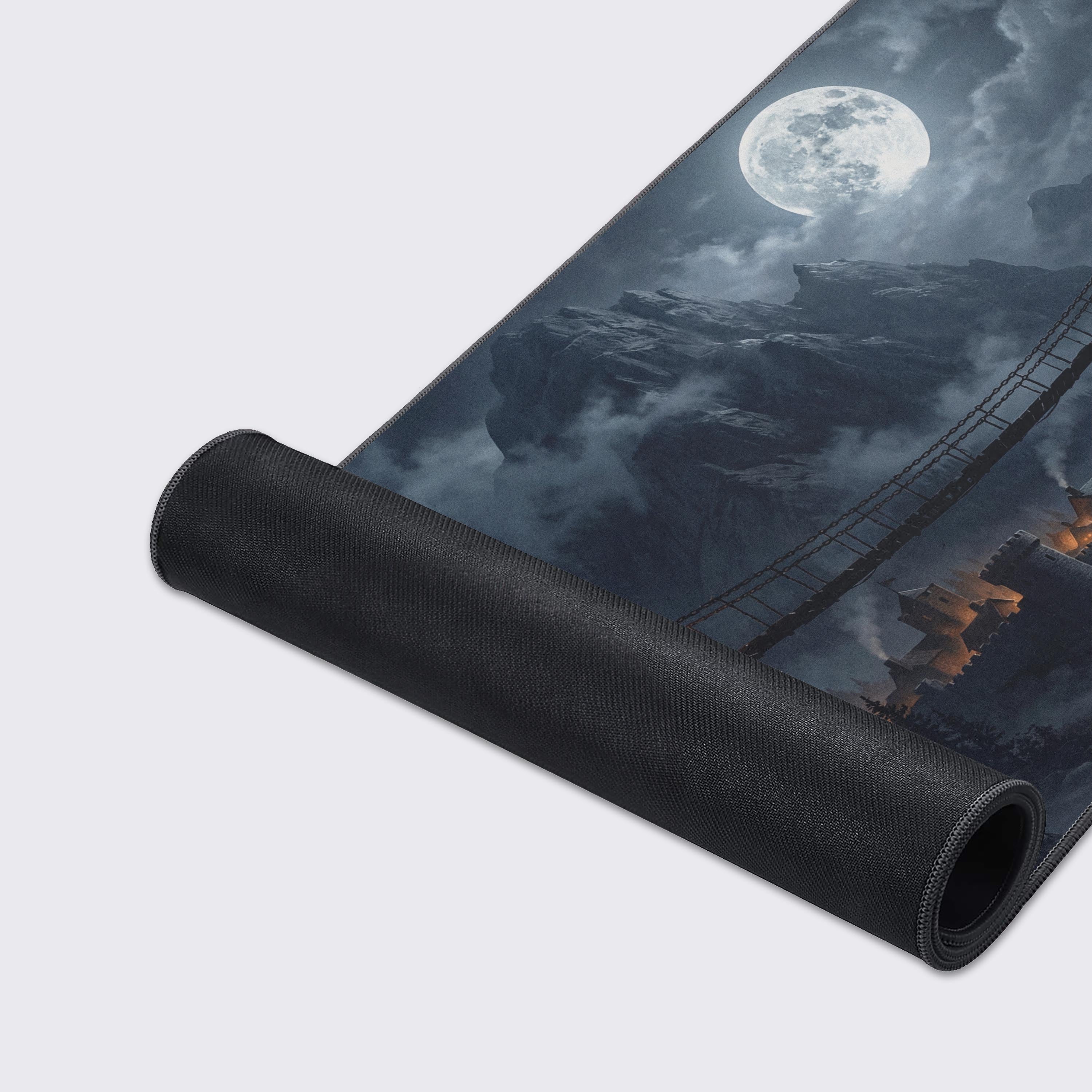 Close-up of The Last Bridge gaming desk mat, highlighting the detailed art of a fortress and the smooth, textured fabric with durable stitched edges for optimal performance. - Epic Design Pads & Mousepads