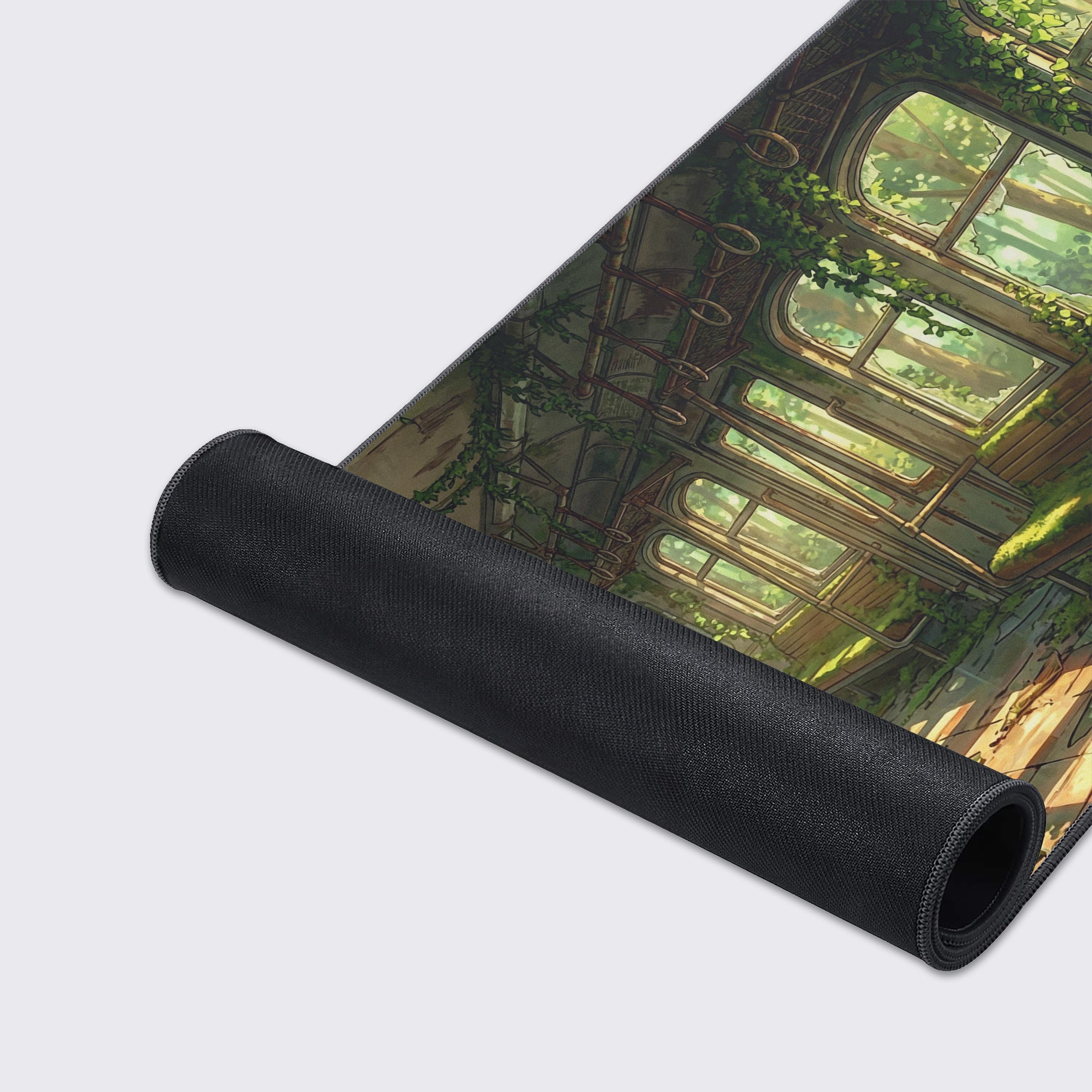 Close-up shot of the Reclaimed Rails Gaming Desk Mat, highlighting the high-quality fabric texture and durable stitched edges of the overgrown train design. - Epic Design Pads & Mousepads
