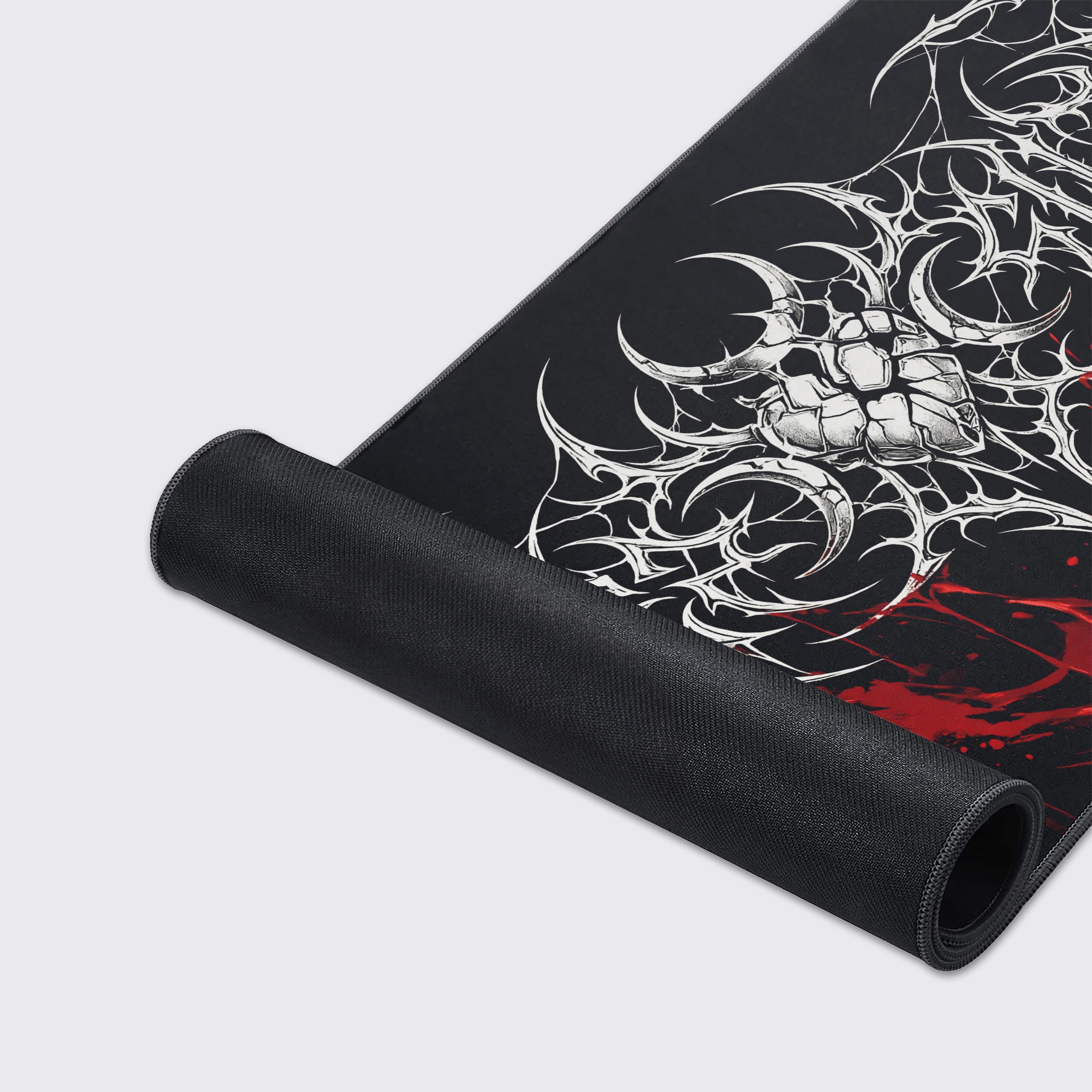 A close-up of the Crimson Sigil mouse pad highlighting the high-quality stitched edges and smooth fabric texture of the intricate, blood-splatter design. - Epic Design Pads & Mousepads