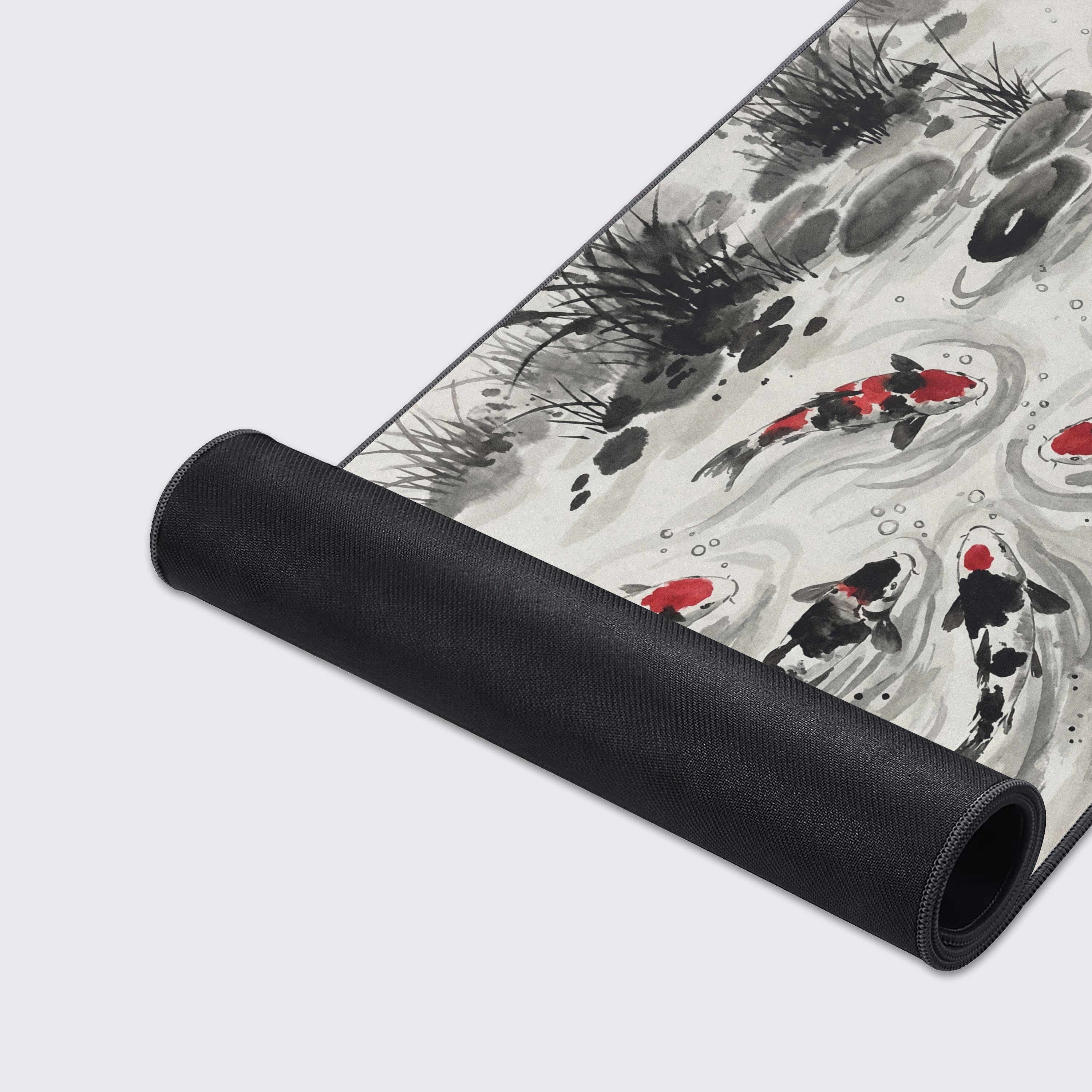 Close-up of the Ink Flow Koi mouse pad's smooth texture and durable stitched edges, highlighting the detailed Sumi-e style artwork of red and black fish. - Epic Design Pads & Mousepads