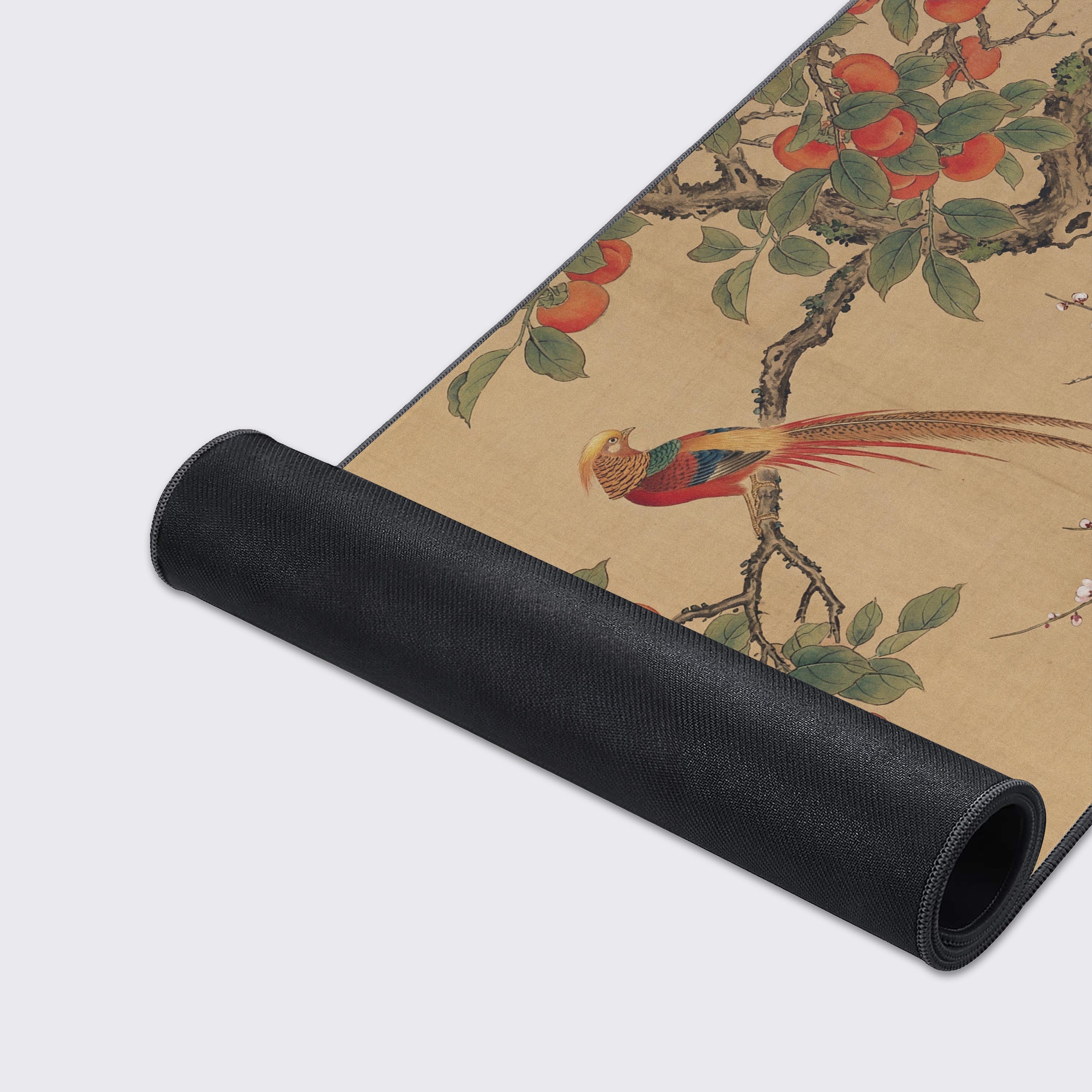 Close-up of the Imperial Harvest gaming desk mat highlighting its smooth fabric texture, stitched edges, and the detailed Golden Pheasant artwork. - Epic Design Pads & Mousepads