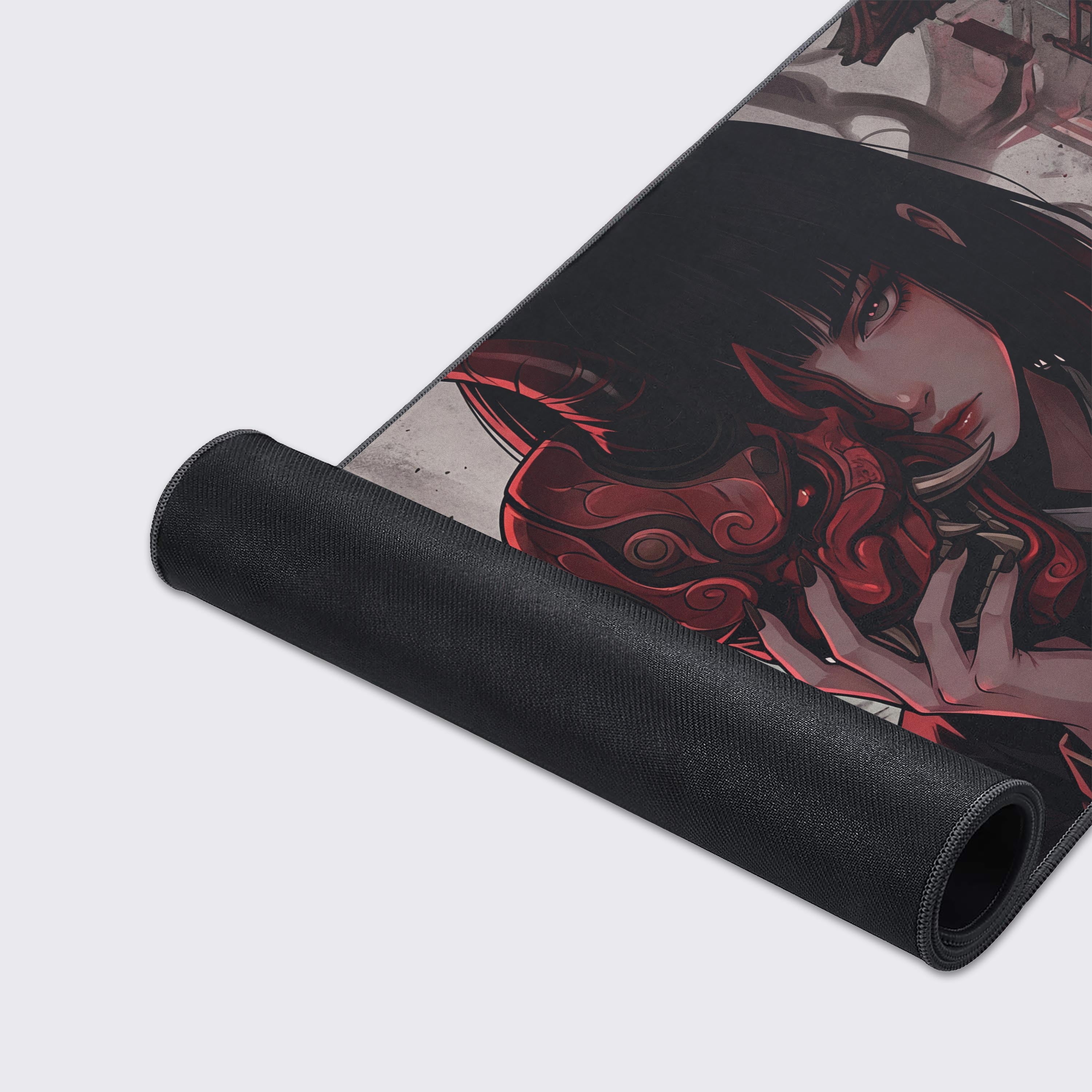 Close-up of the Oni's Shadow gaming desk mat showcasing the smooth fabric texture, stitched edges, and detailed Japanese demon artwork. - Epic Design Pads & Mousepads