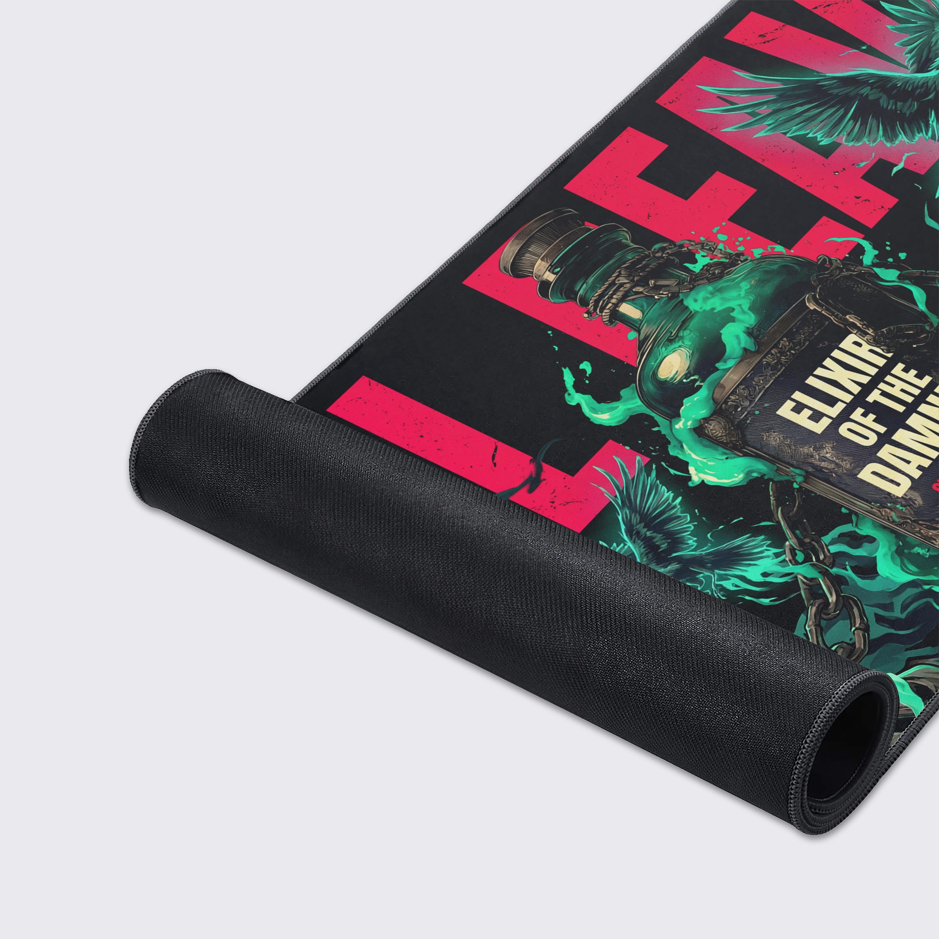 Close-up of the Soul Reaver mouse pad's high-quality stitched edges and smooth fabric texture, highlighting the vibrant green and pink skeletal hand and raven artwork. - Epic Design Pads & Mousepads
