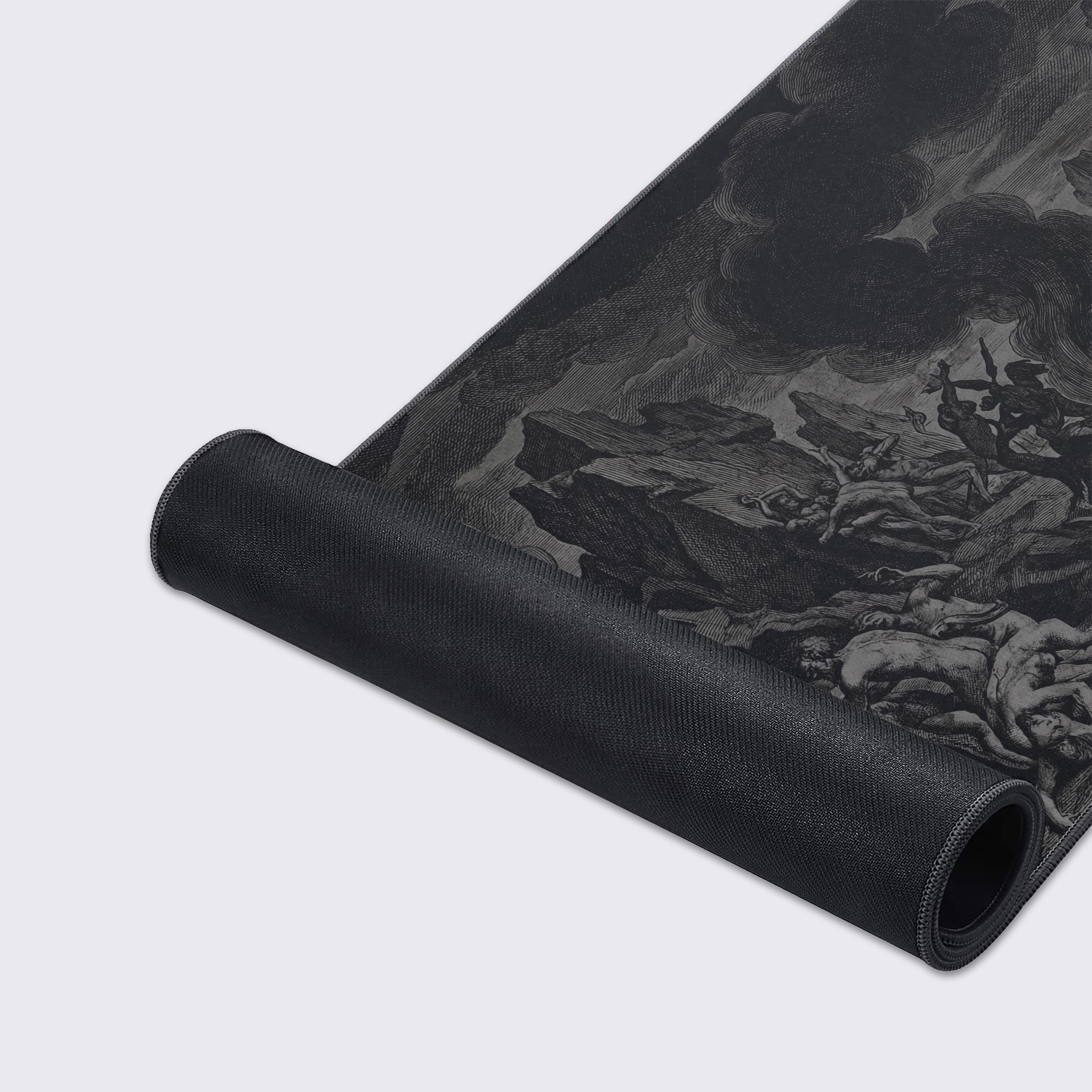 A close-up of the Infernal Etching gaming desk mat highlights its durable stitched edges and detailed, textured fabric, showcasing the chaotic demonic artwork. - Epic Design Pads & Mousepads