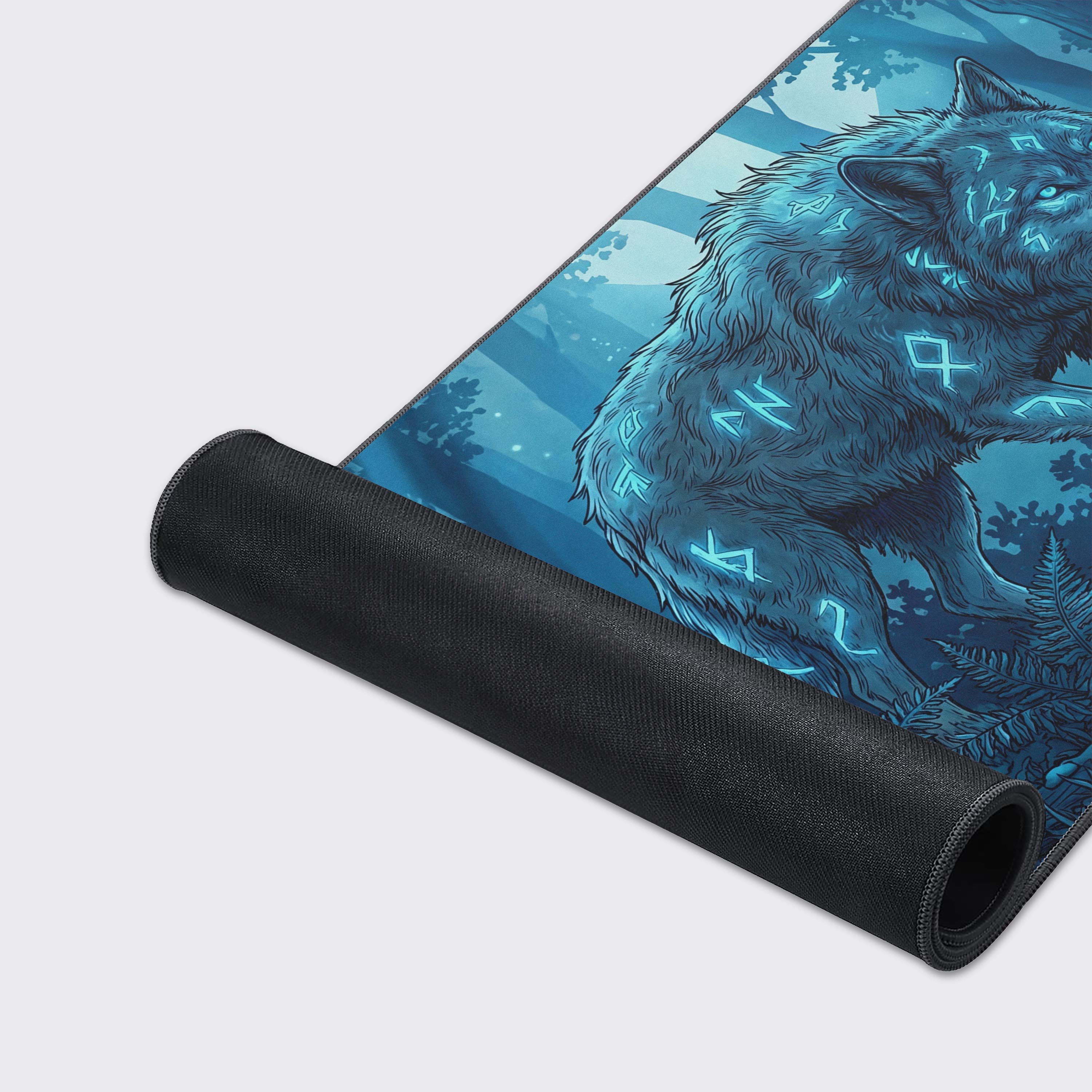 A close-up of the Spirit Wolf Mouse Pad's high-quality texture and stitched edges, showcasing the glowing blue runes on the wolf's fur in sharp detail. - Epic Design Pads & Mousepads