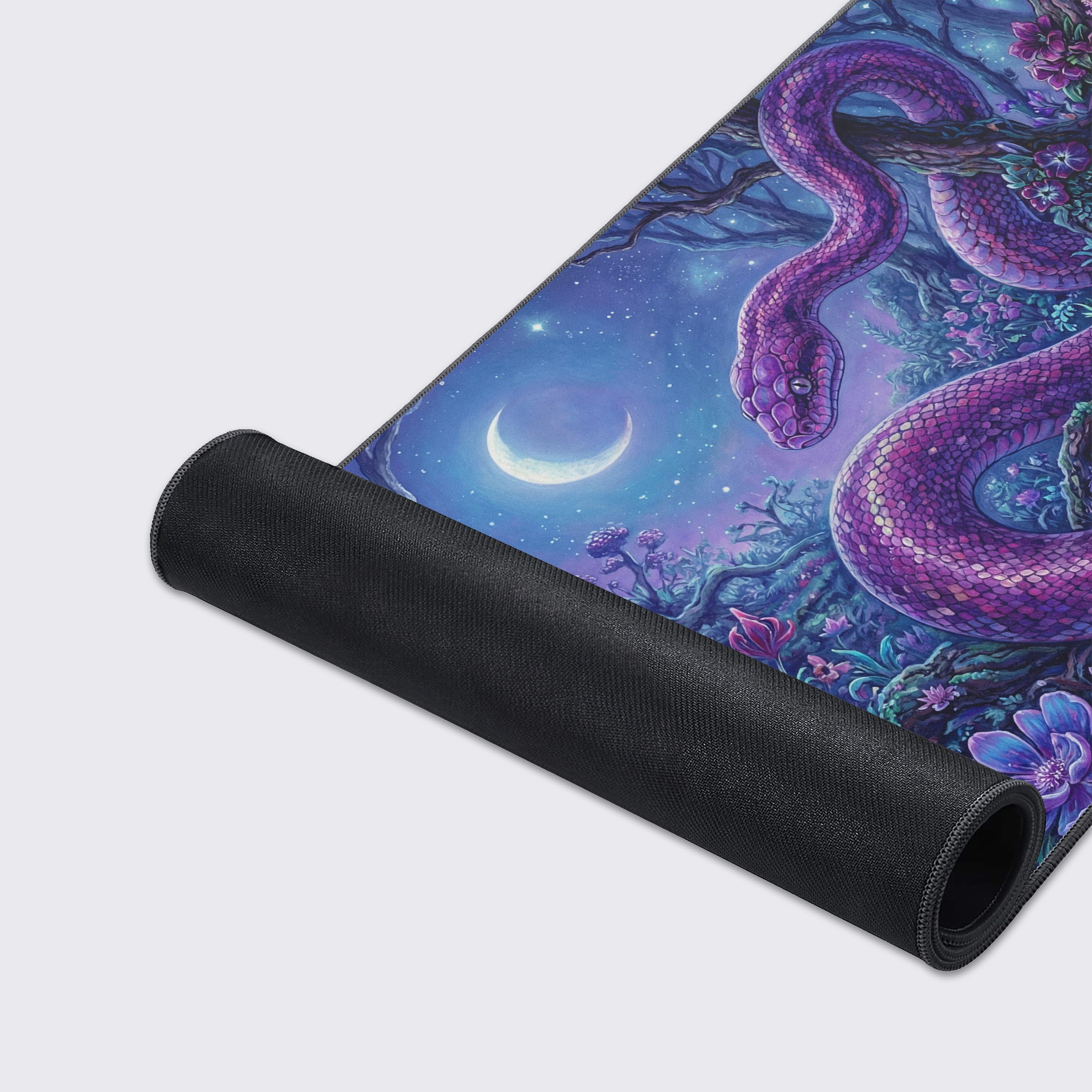 A close-up of the Mystic Serpent gaming desk mat showcasing the high-quality fabric texture and durable stitched edges, with the detailed purple snake art in focus. - Epic Design Pads & Mousepads