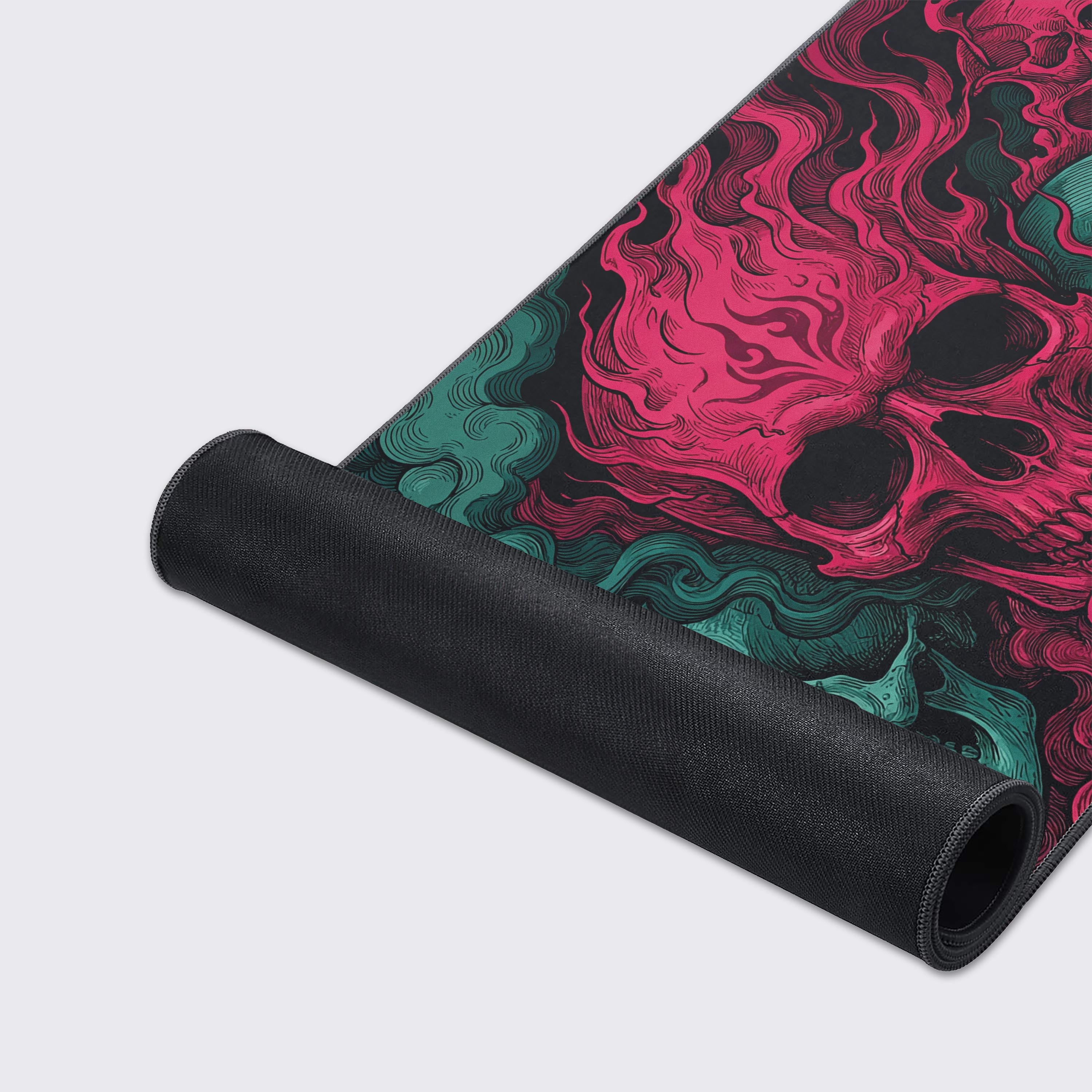 Close-up of the Crimson Trinity mouse pad's smooth fabric texture and durable stitched edges, highlighting the vibrant pink and teal skull artwork. - Epic Design Pads & Mousepads