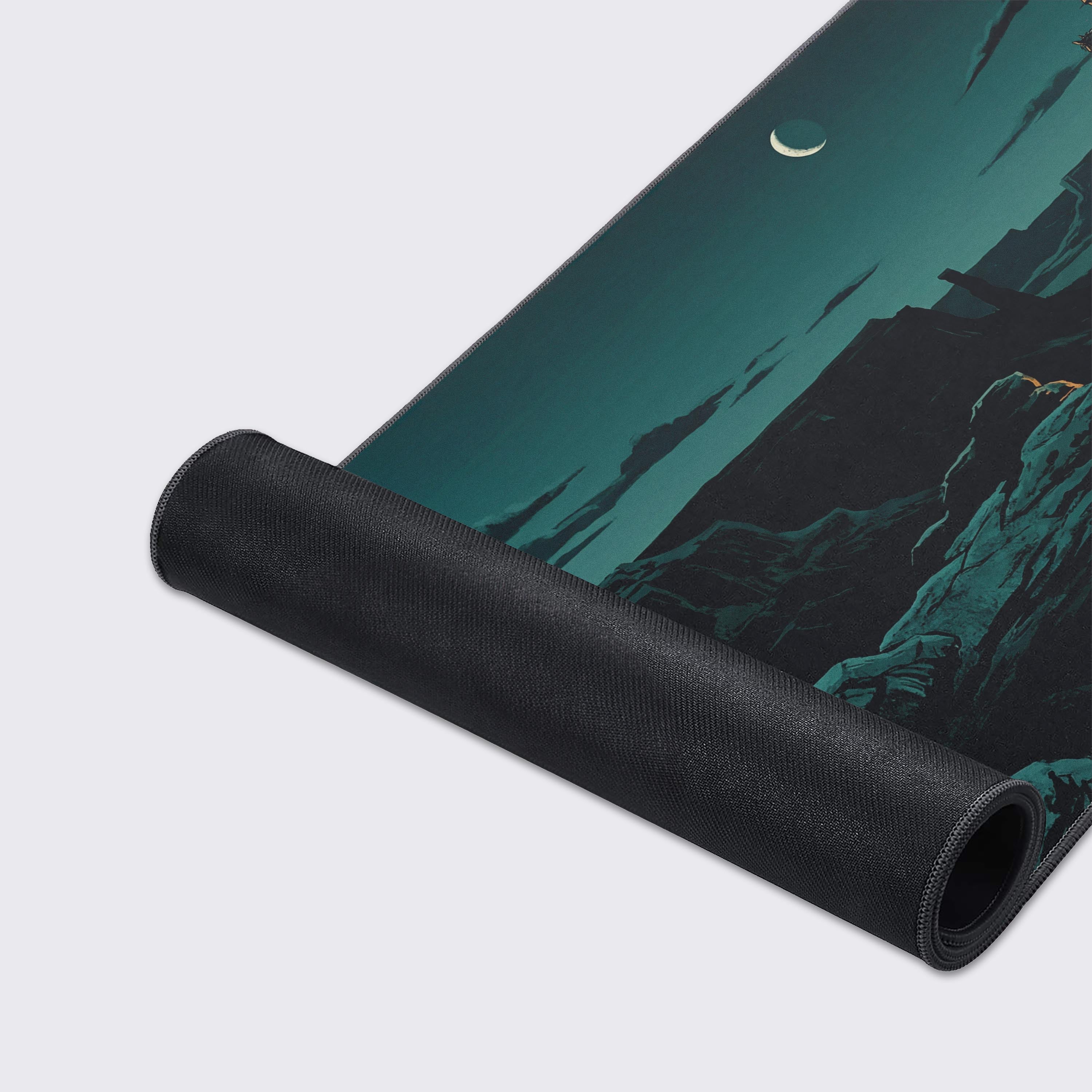 A close-up of the Canyon Sentinel gaming desk mat, highlighting the smooth fabric texture and stitched edges, with the detailed illustration of a cowboy on a cliff. - Epic Design Pads & Mousepads