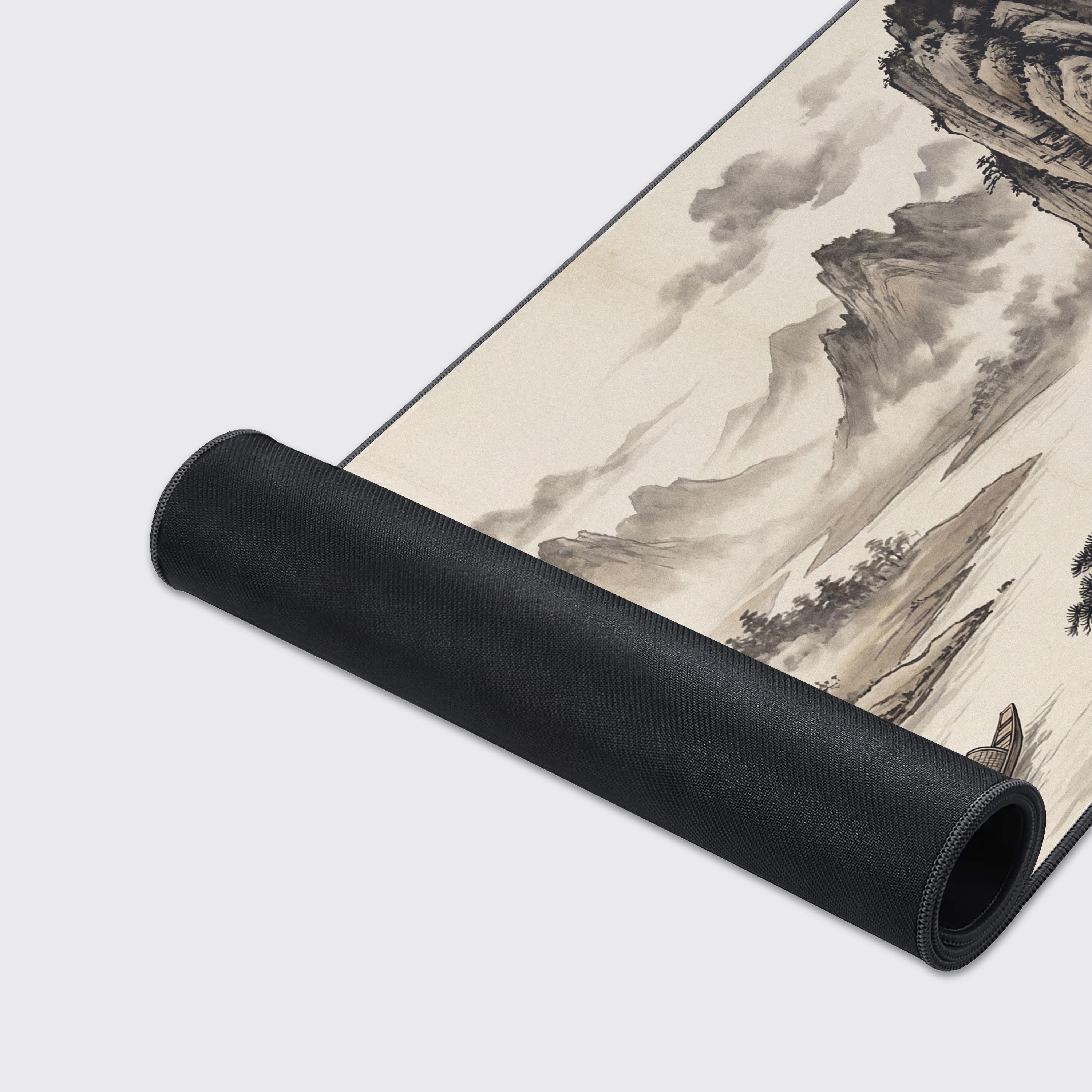 Close-up of the River Solitude gaming desk mat showing the smooth fabric texture and durable stitched edges. The detailed ink wash mountain artwork is clearly visible. - Epic Design Pads & Mousepads