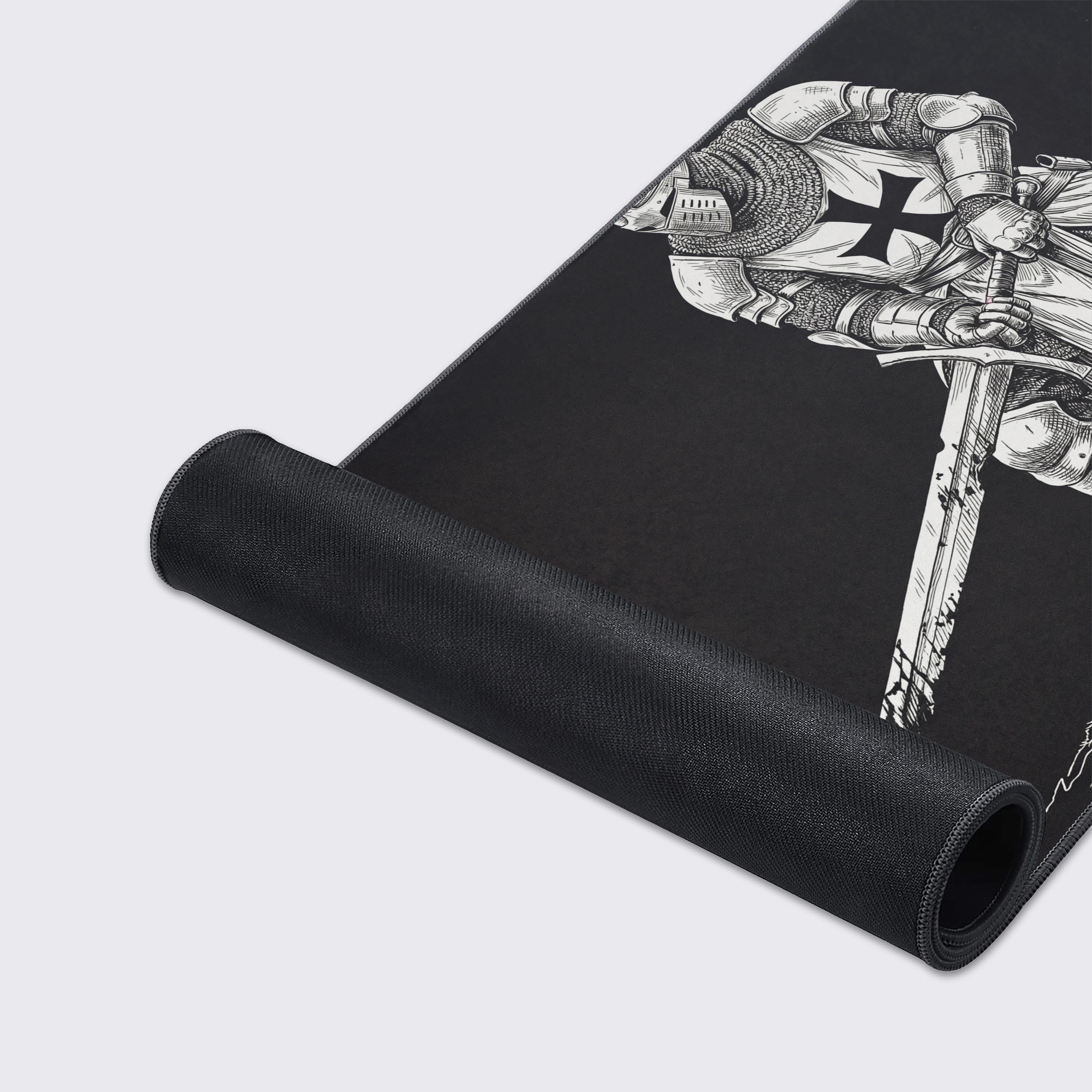 Close-up of the Crusader's Stance gaming desk mat, highlighting the detailed knight illustration, smooth fabric texture, and durable stitched edges for performance. - Epic Design Pads & Mousepads