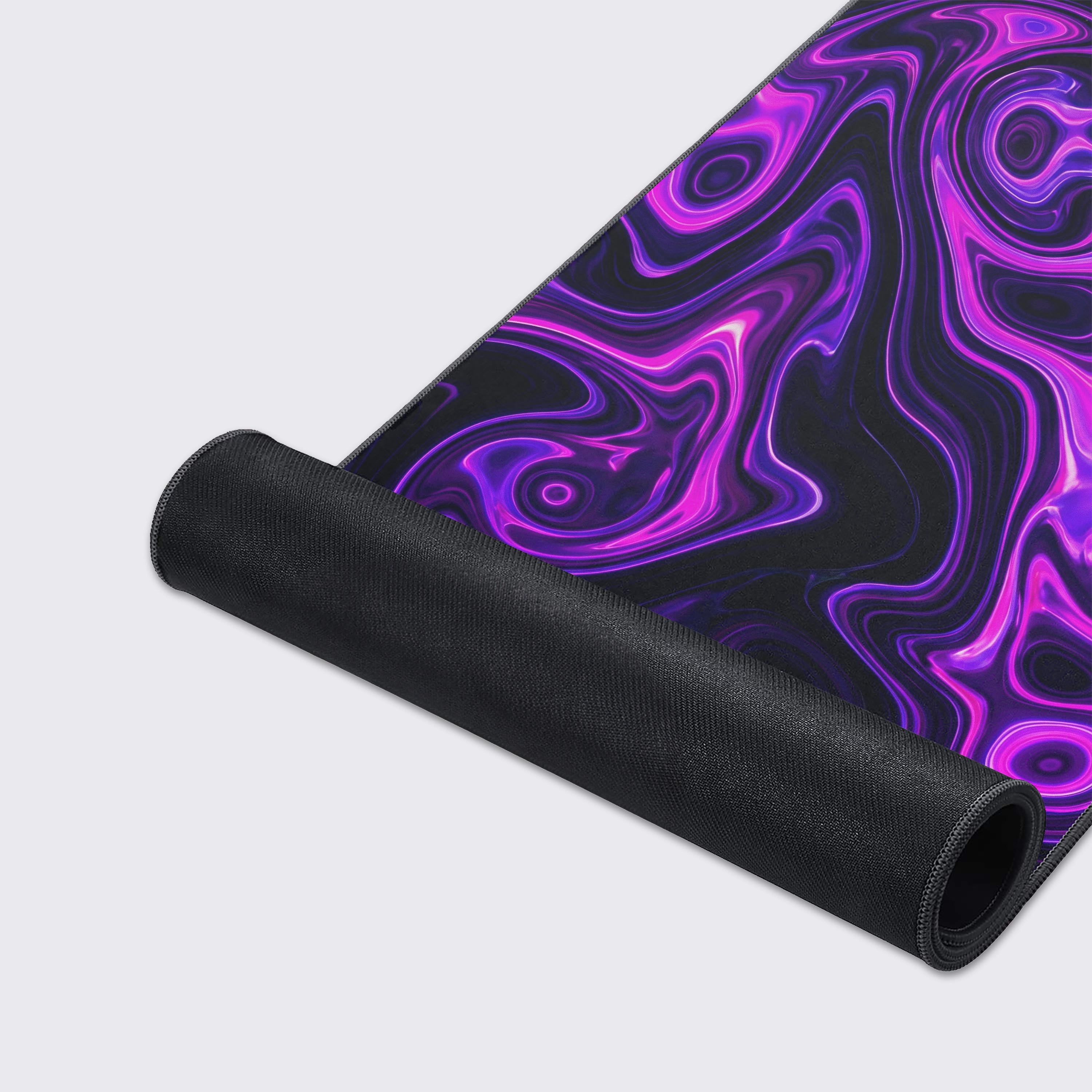 Close-up on the Violet Flux gaming desk mat's durable stitched edges and smooth texture, highlighting the detailed purple and black liquid energy pattern. - Epic Design Pads & Mousepads