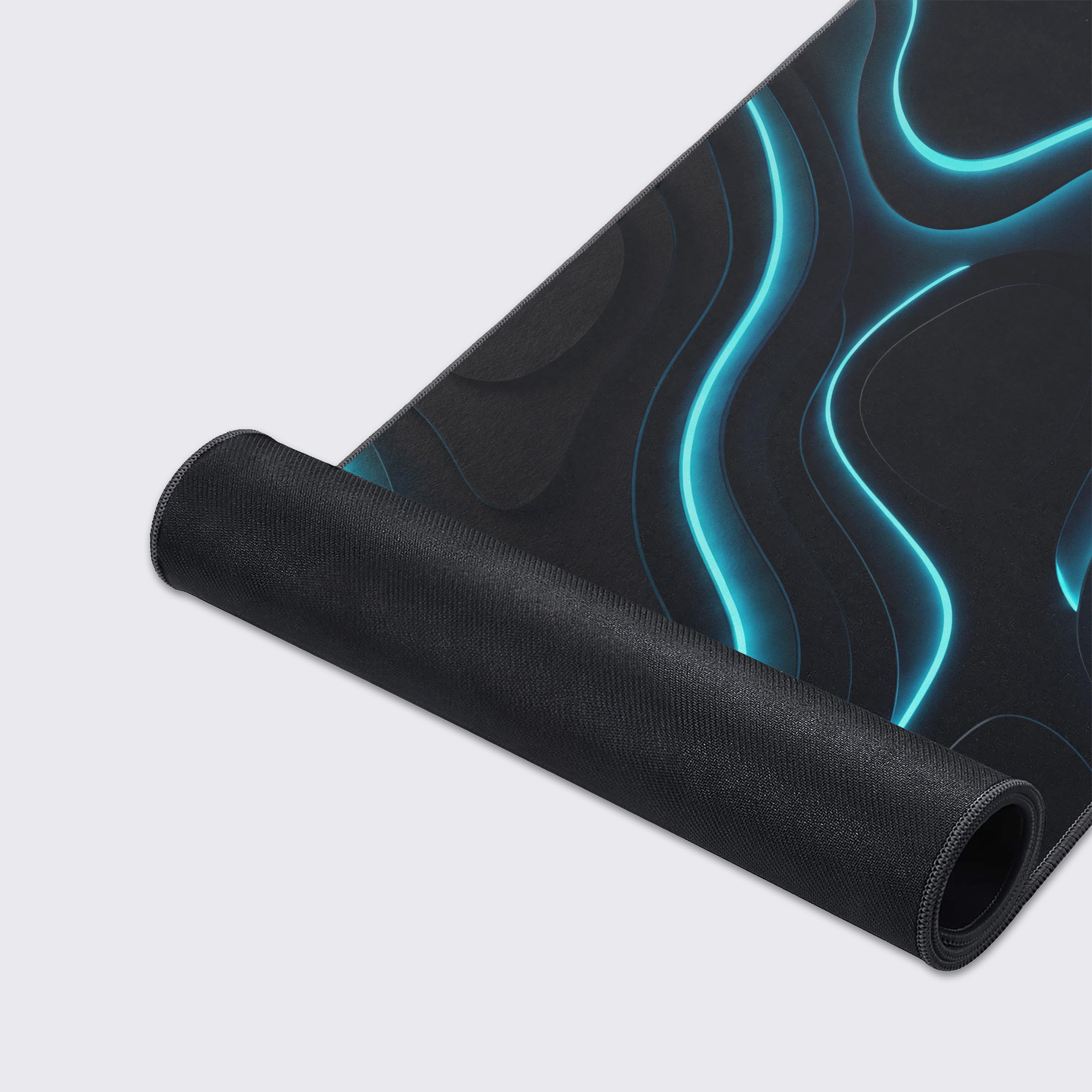 Close-up shot of the Neon Topography mouse pad, highlighting the smooth fabric texture, durable stitched edges, and vibrant cyan glowing line design. - Epic Design Pads & Mousepads