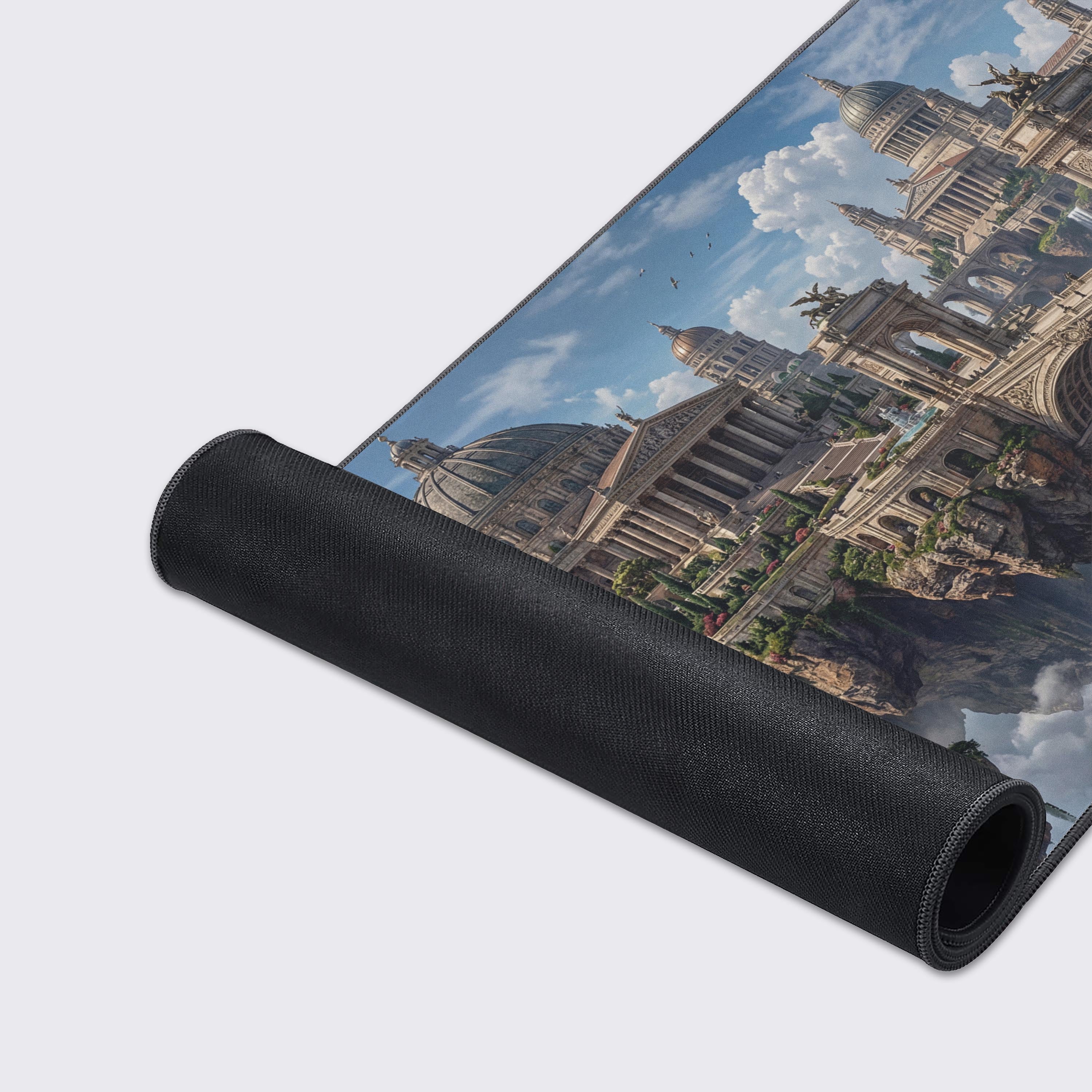 A close-up of the Aetherial Empire Gaming Desk Mat, highlighting the high-quality fabric and stitched edges against the detailed floating island artwork. - Epic Design Pads & Mousepads