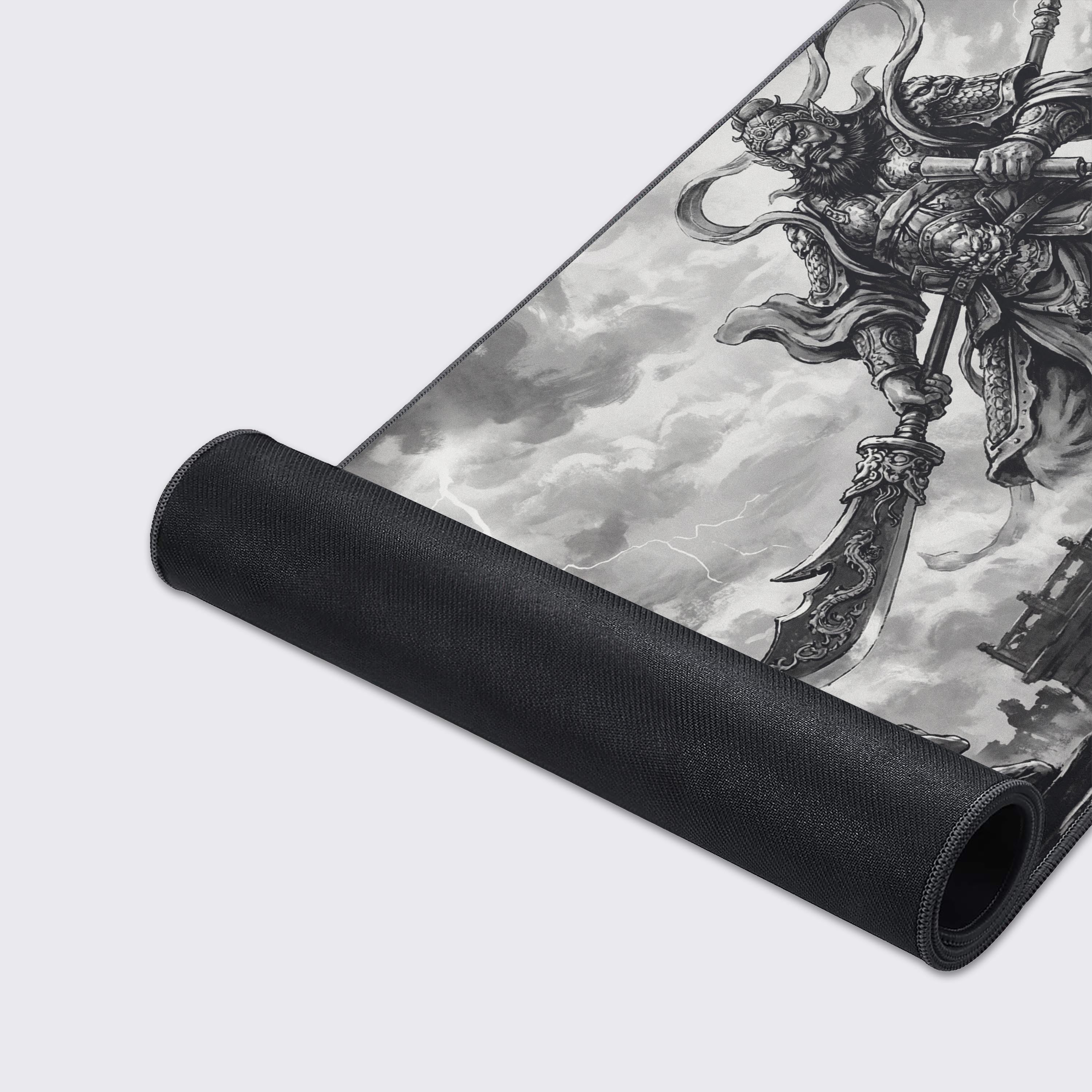 Close-up of the Cloud Deity gaming desk mat's smooth texture and durable stitched edges, highlighting the intricate ink art of the celestial warrior and storm clouds. - Epic Design Pads & Mousepads