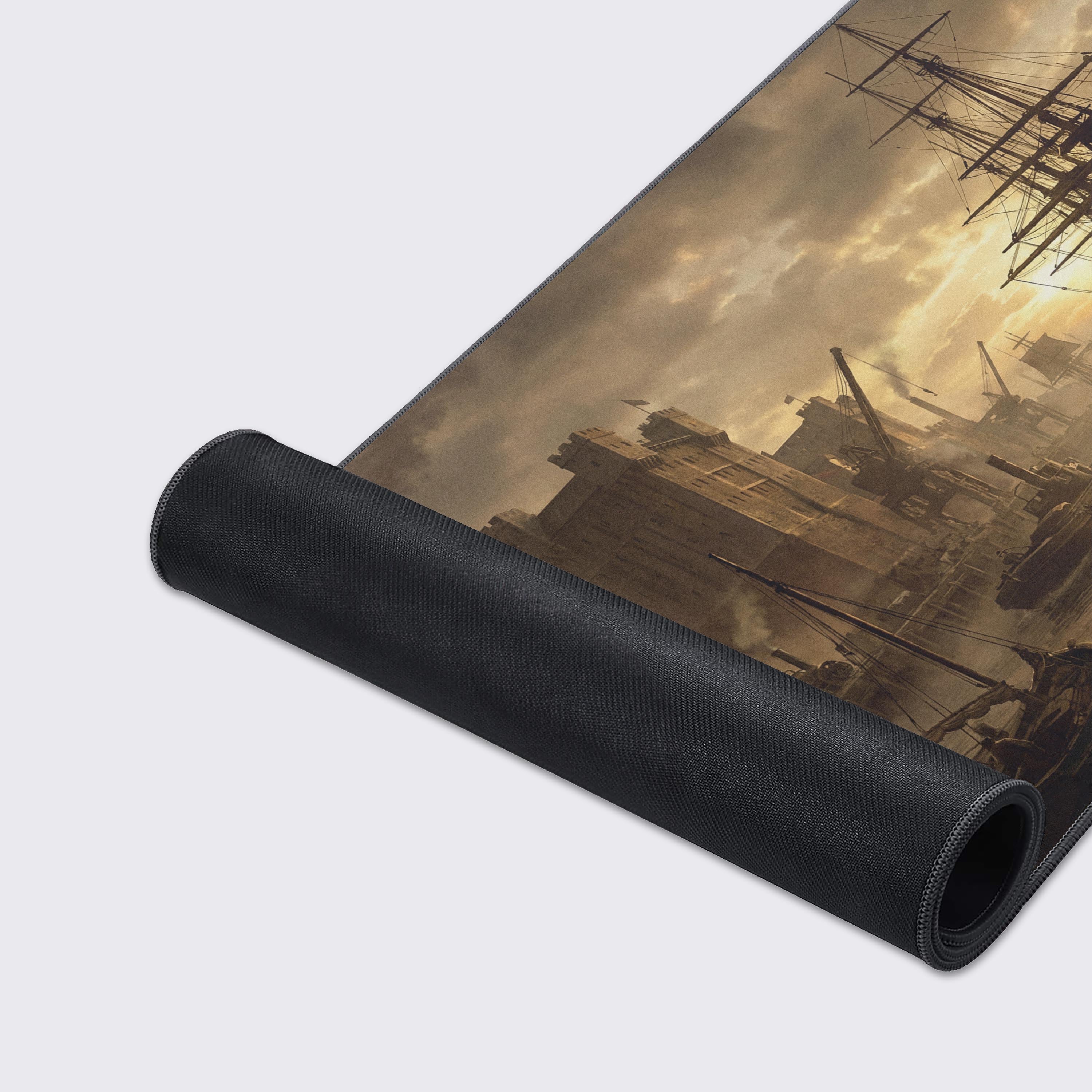 A close-up of the Industrial Dawn mouse pad, highlighting the detailed art of sailing ships and the high-quality stitched edges for durability. - Epic Design Pads & Mousepads
