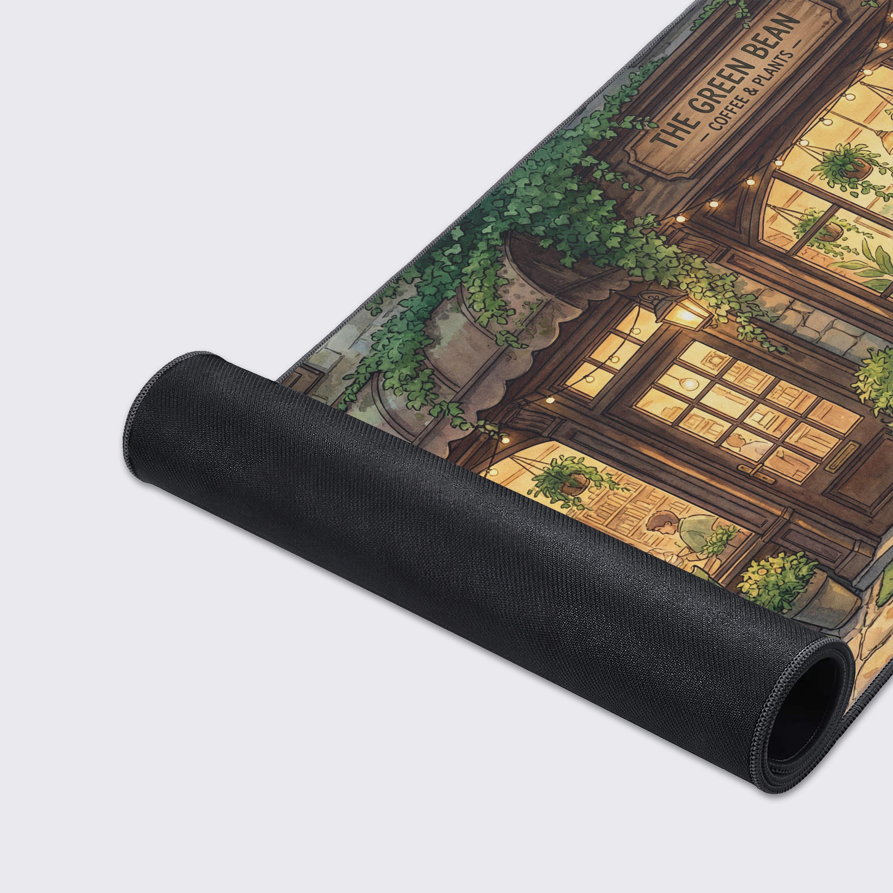A close-up of the Green Bean Cafe mouse pad, highlighting the detailed illustration, smooth fabric texture, and durable anti-fray stitched edges for lasting quality. - Epic Design Pads & Mousepads
