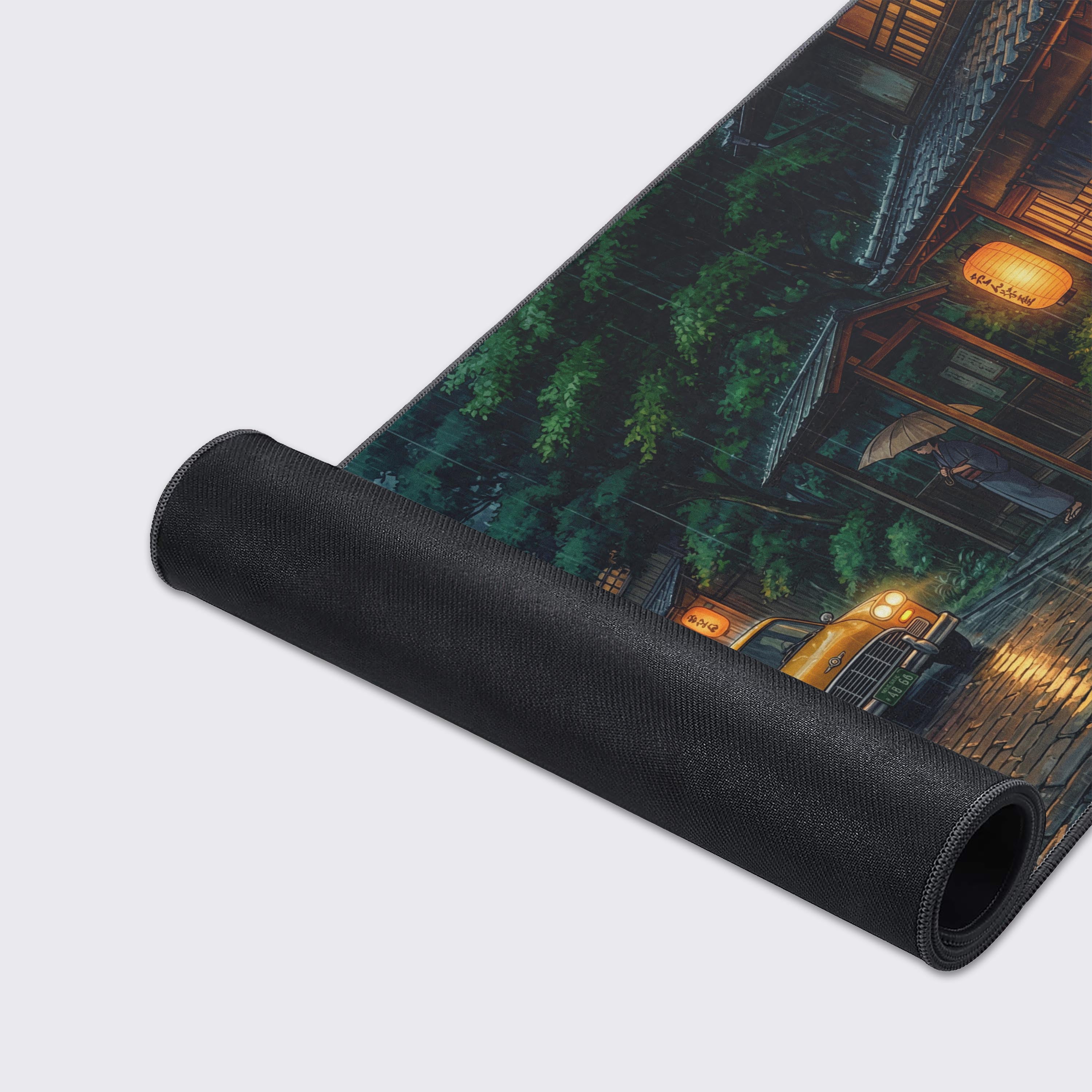 Close-up of the Rainy Taxi gaming desk mat showing the detailed Japanese street scene, smooth texture, and durable stitched edges. - Epic Design Pads & Mousepads
