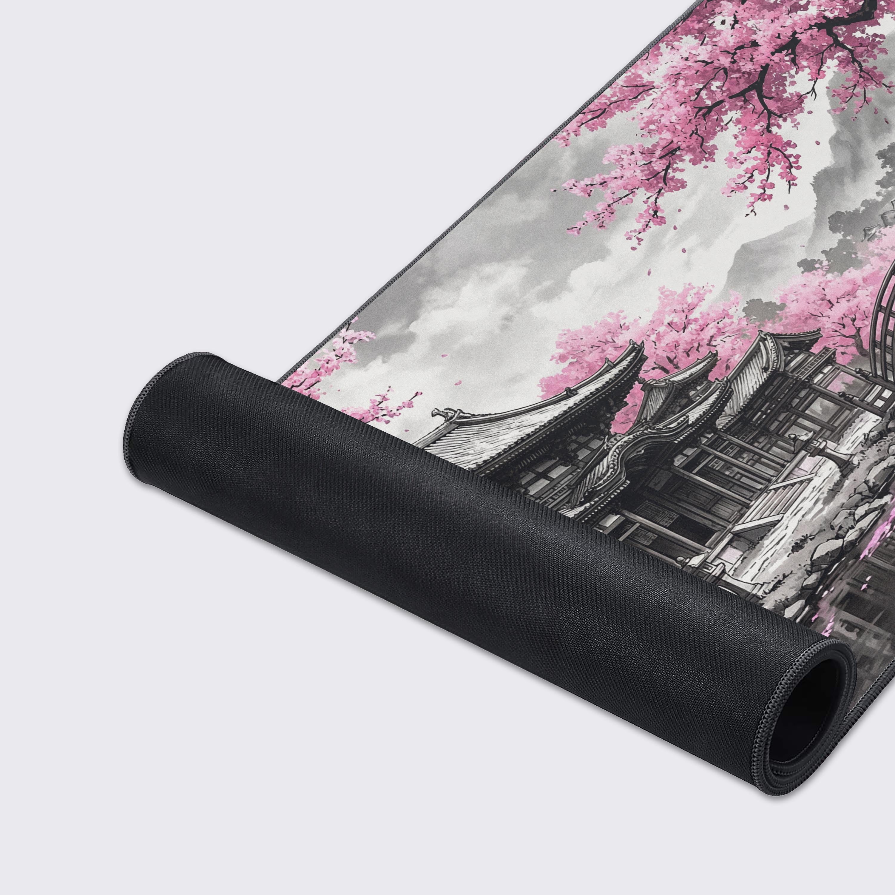A close-up of the Ancient Spring Gaming Desk Mat's high-quality fabric and anti-fray stitched edges, showcasing the detailed grayscale temple artwork. - Epic Design Pads & Mousepads