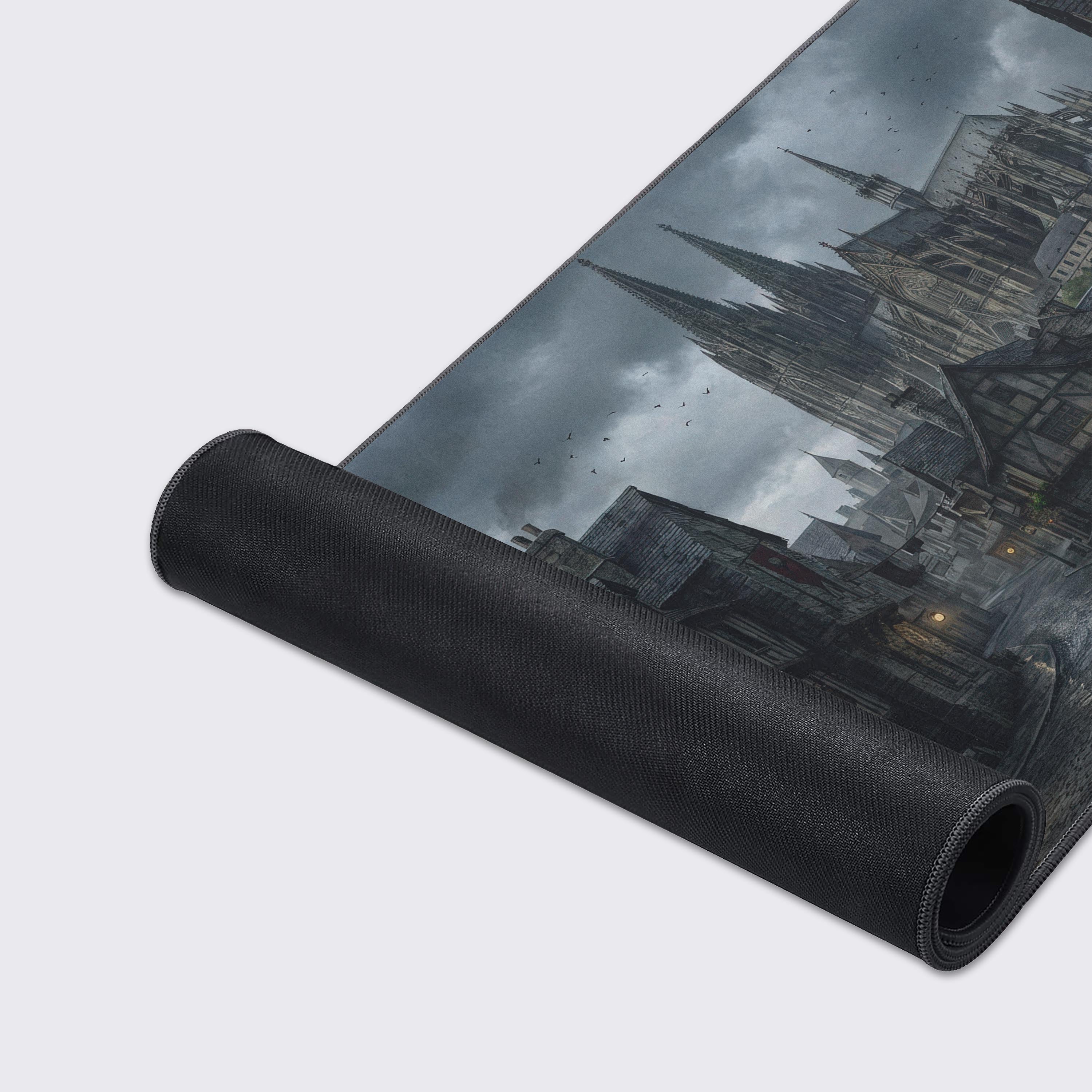 A close-up of the Tavern Night gaming desk mat, highlighting the fine texture, stitched edges, and detailed dark fantasy artwork of the cobblestone tavern scene. - Epic Design Pads & Mousepads
