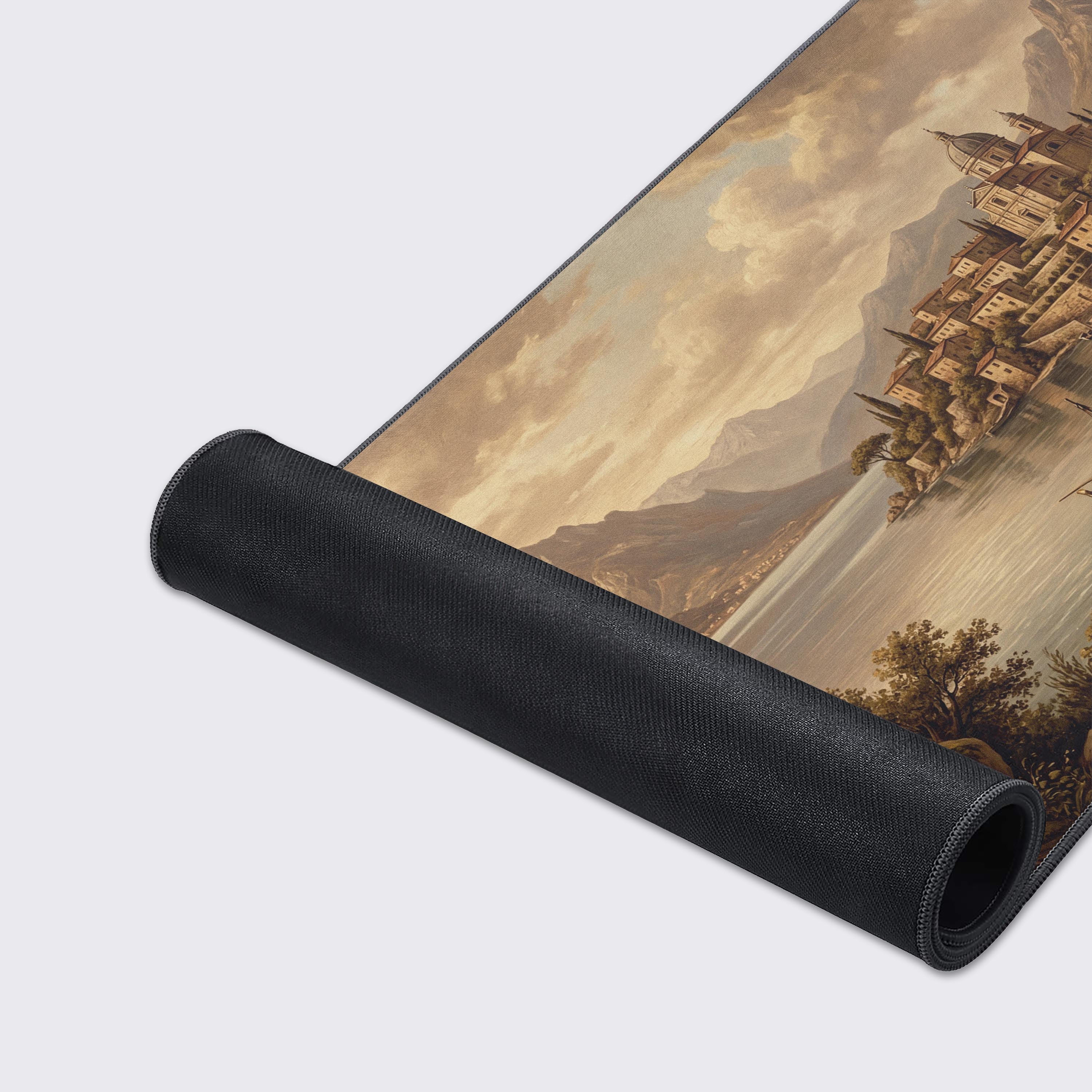 A close-up of the Vintage Shoreline gaming desk mat, highlighting the high-quality fabric texture and durable stitched edges of the beautiful Old World landscape painting. - Epic Design Pads & Mousepads