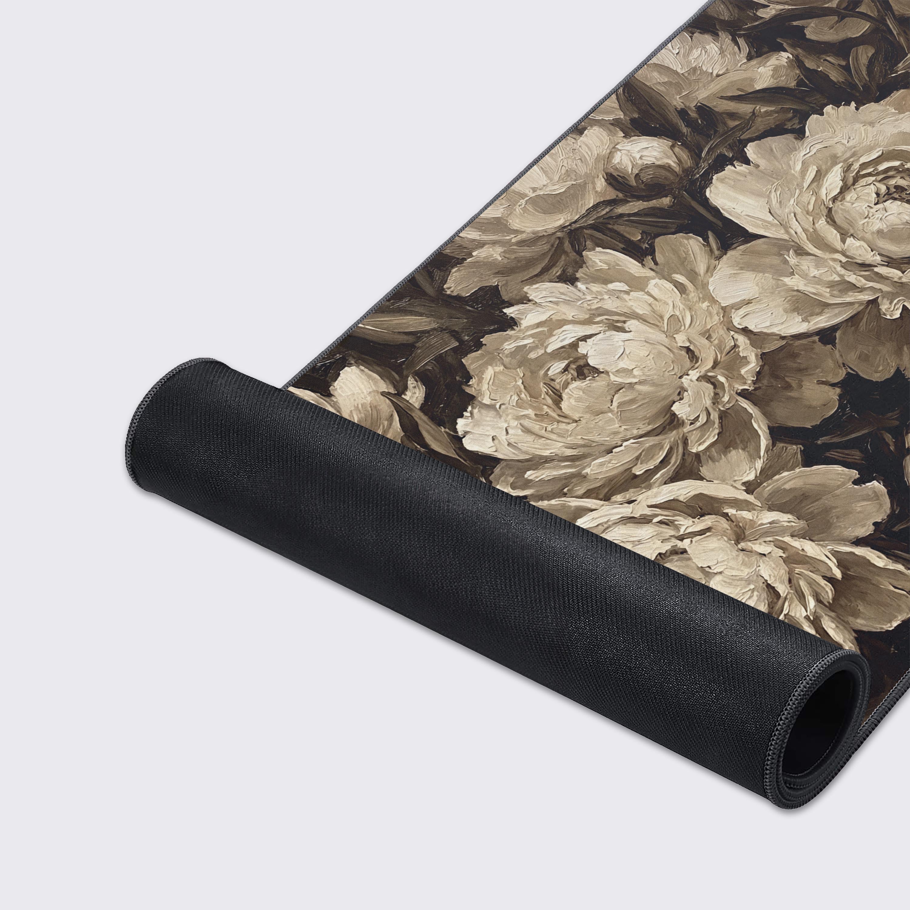 Close-up of the Sepia Blooms Gaming Desk Mat highlighting the high-quality fabric texture, stitched edges, and the detailed, monochrome peony artwork. - Epic Design Pads & Mousepads