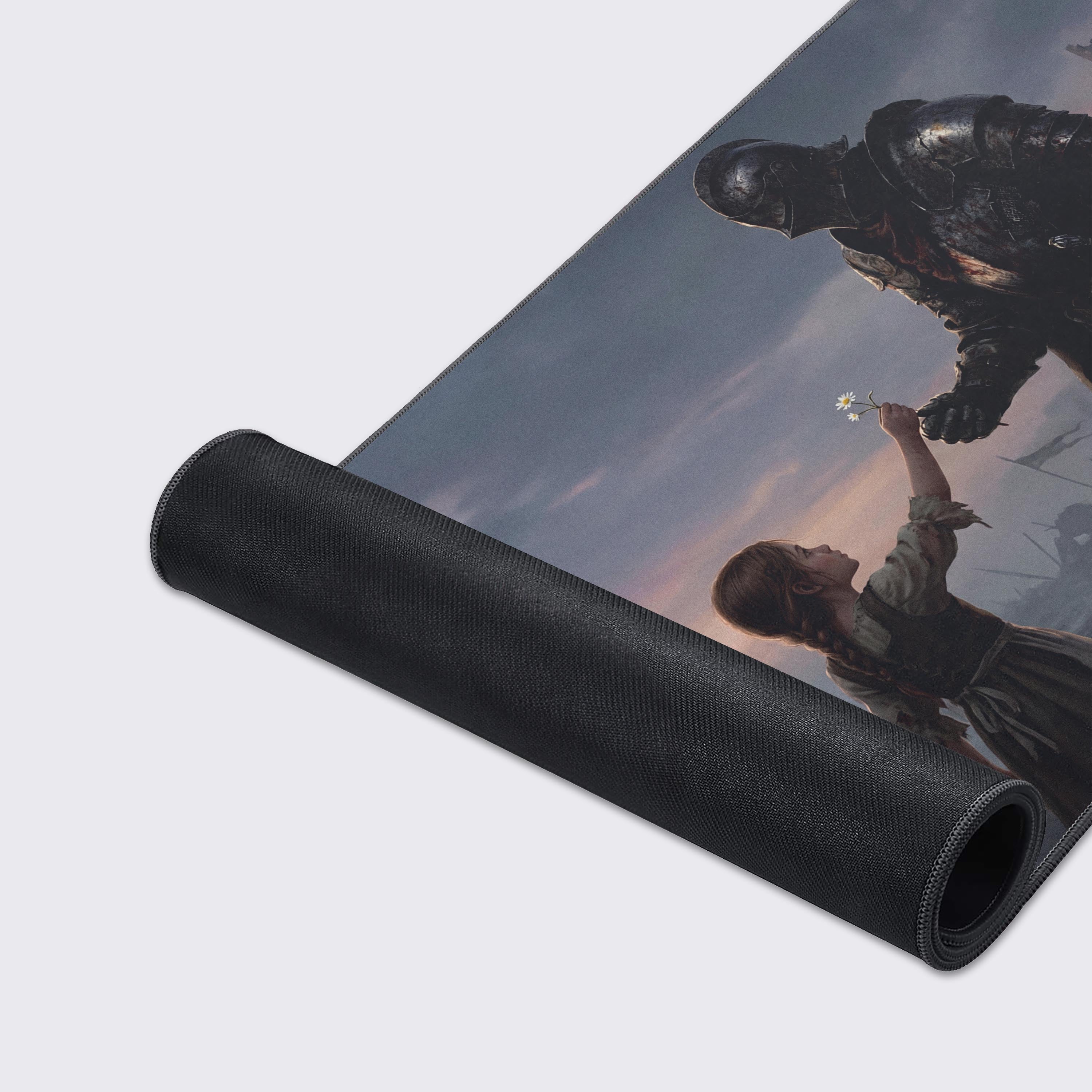A close-up on the high-quality fabric and stitched edges of the 'Forgotten Promise' Gaming Desk Mat, showcasing the detailed artwork of the battle-worn knight. - Epic Design Pads & Mousepads