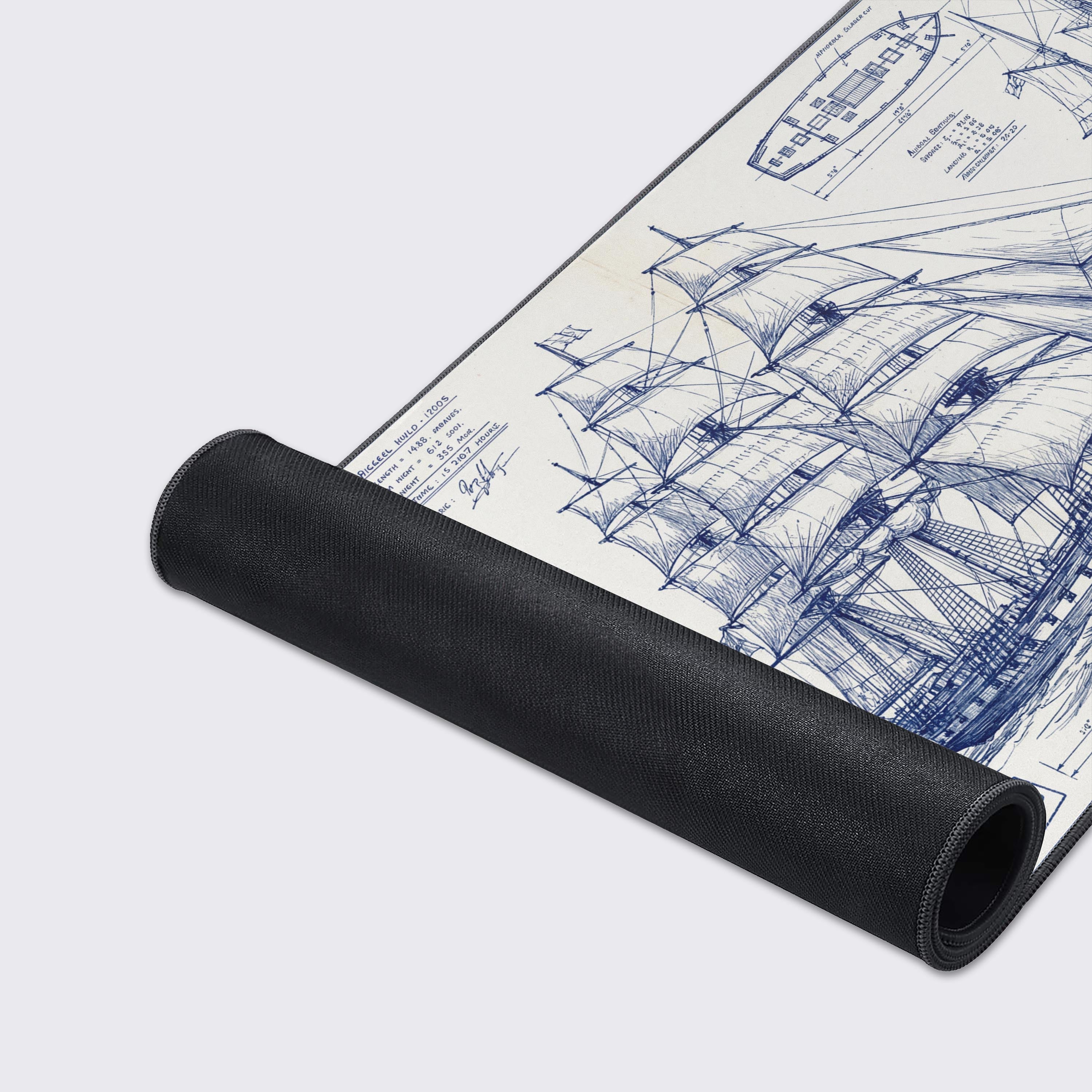 Close-up of the Shipwright's Draft Gaming Desk Mat showing the detailed blue line art of the ship blueprint and the high-quality stitched edges of the fabric. - Epic Design Pads & Mousepads
