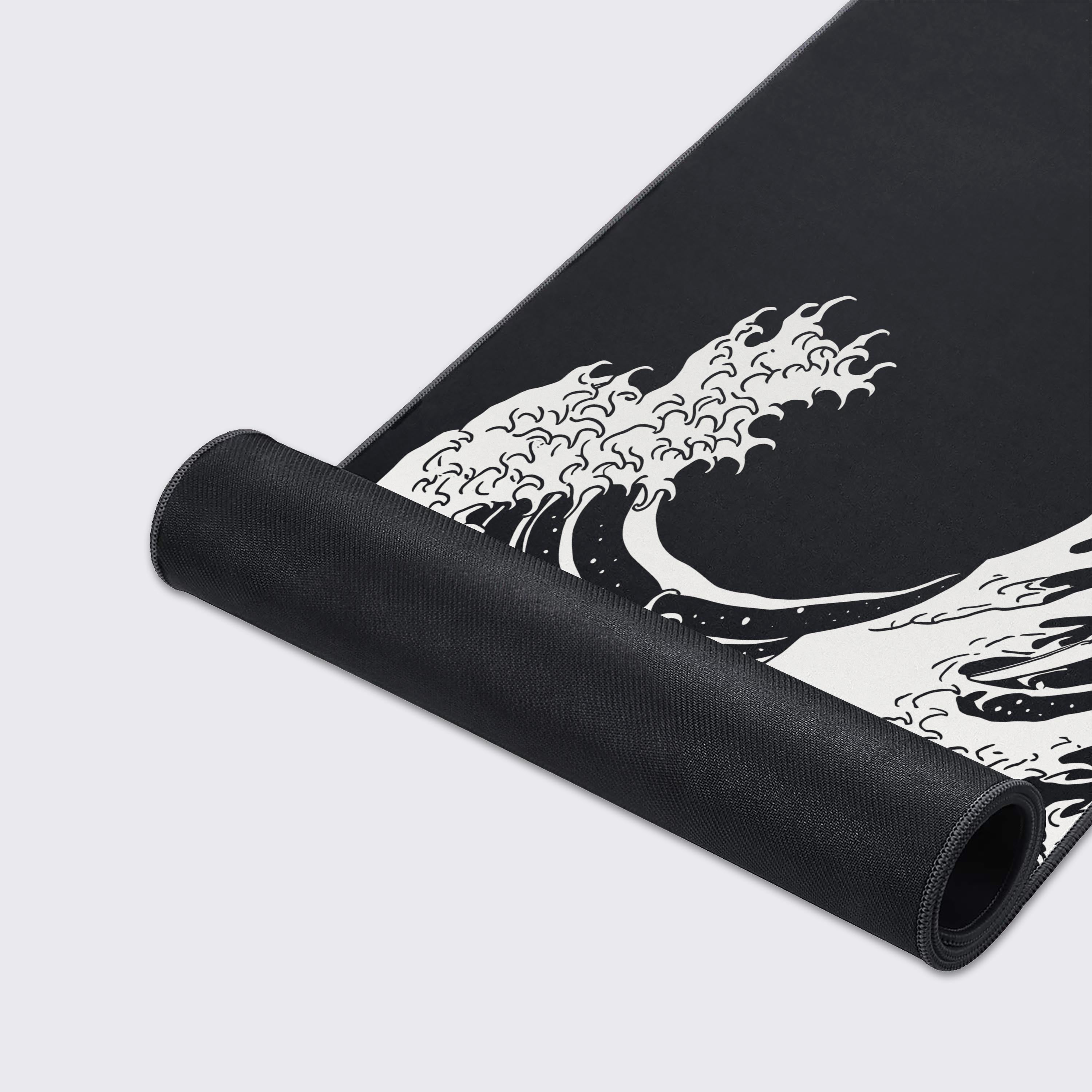 Close-up of the Great Wave Gaming Desk Mat, highlighting the detailed monochrome artwork, smooth fabric texture, and durable stitched edges for long-lasting use. - Epic Design Pads & Mousepads
