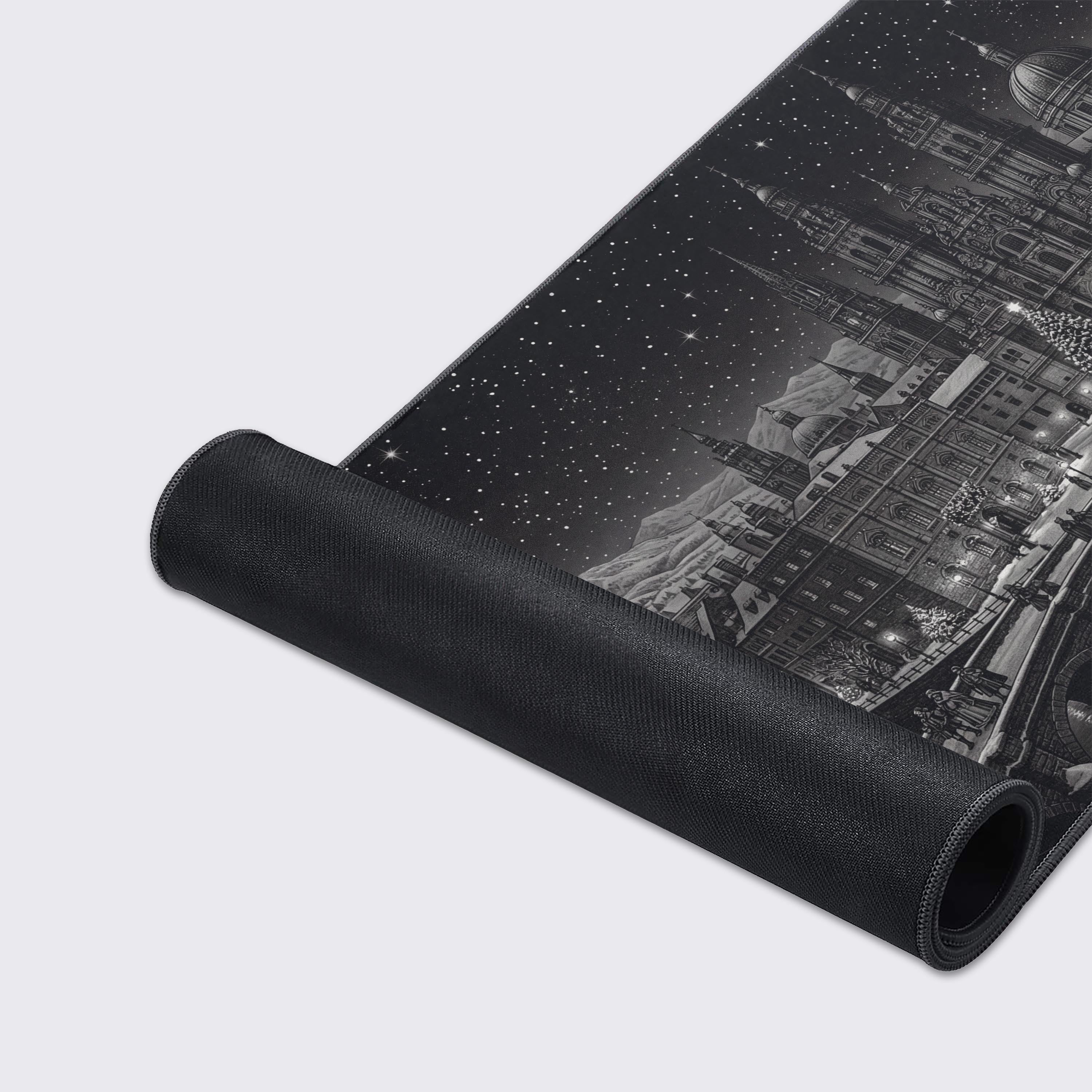 Close-up of the Winter Spire mouse pad's high-quality fabric texture and durable stitched edges, showcasing the detailed black and white cityscape artwork. - Epic Design Pads & Mousepads