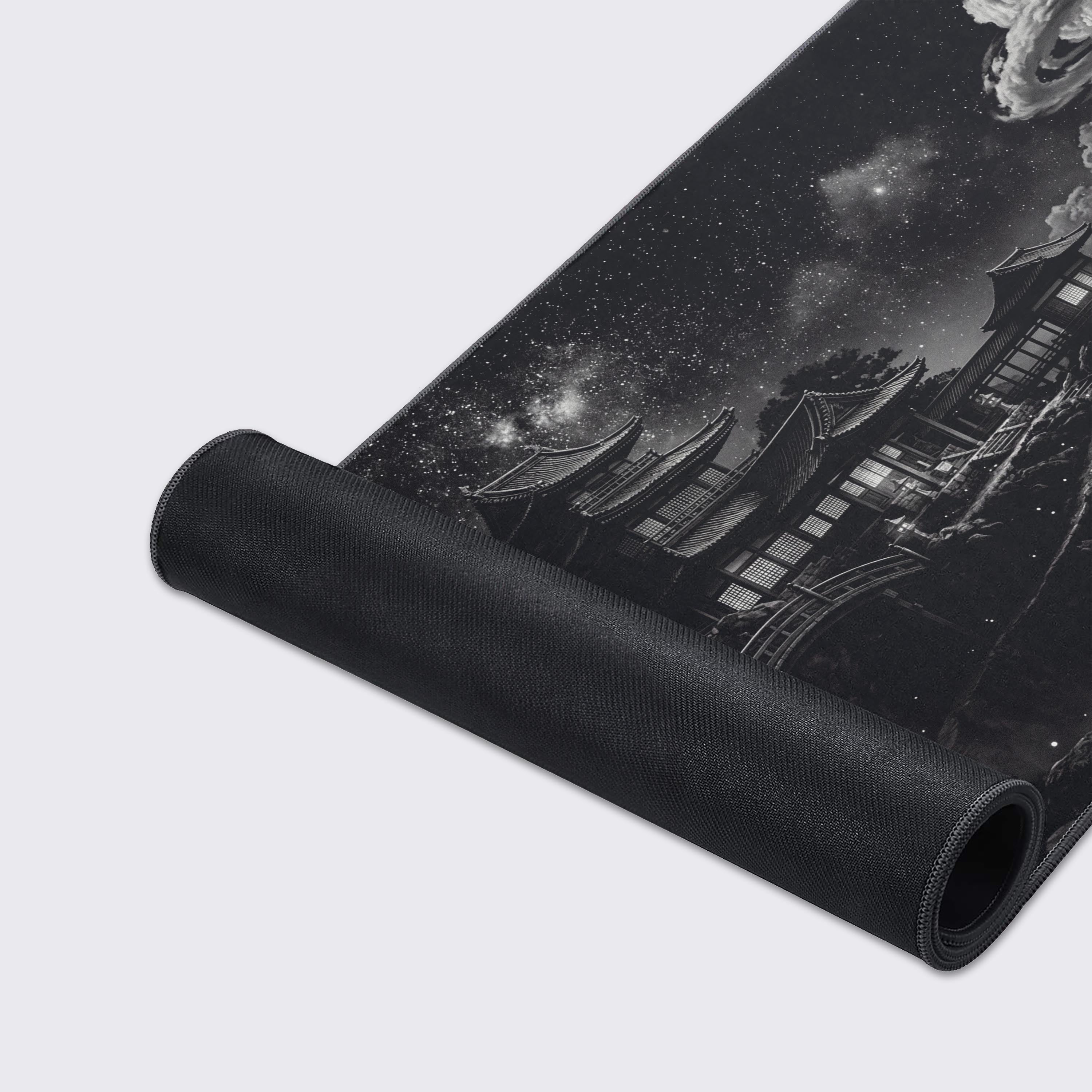 A close-up of the Silent Peaks gaming desk mat highlighting its smooth texture, detailed monochrome mountain print, and durable stitched edges. - Epic Design Pads & Mousepads