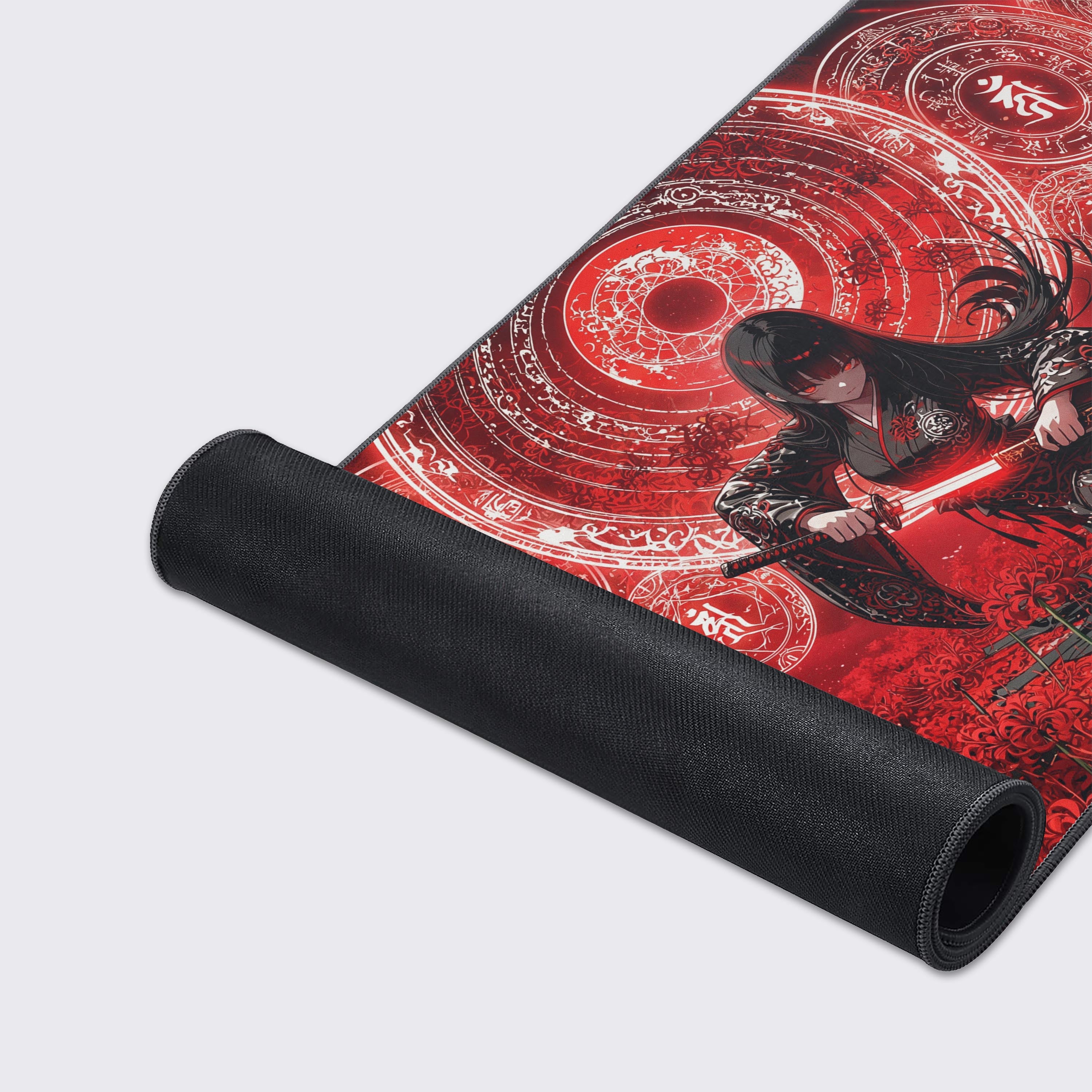 A close-up of the Crimson Spell gaming desk mat's high-quality fabric and stitched edges, highlighting the vibrant red spider lilies and magic rune artwork. - Epic Design Pads & Mousepads