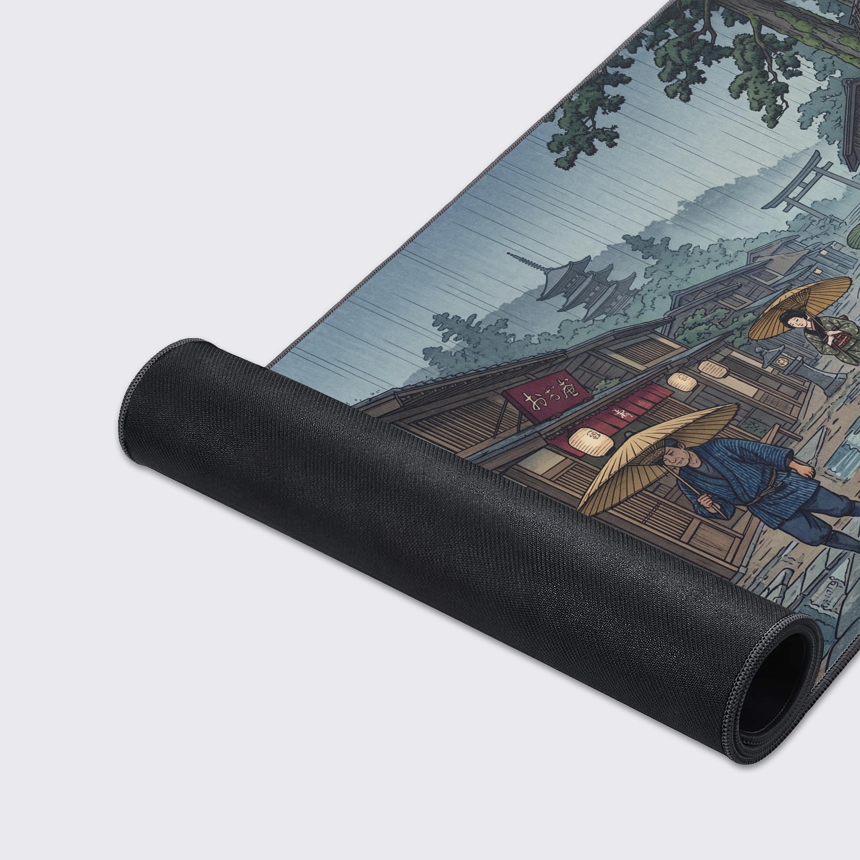 A close-up of the Monsoon Kyoto gaming desk mat, showing the detailed artwork, smooth texture, and durable stitched edges. - Epic Design Pads & Mousepads