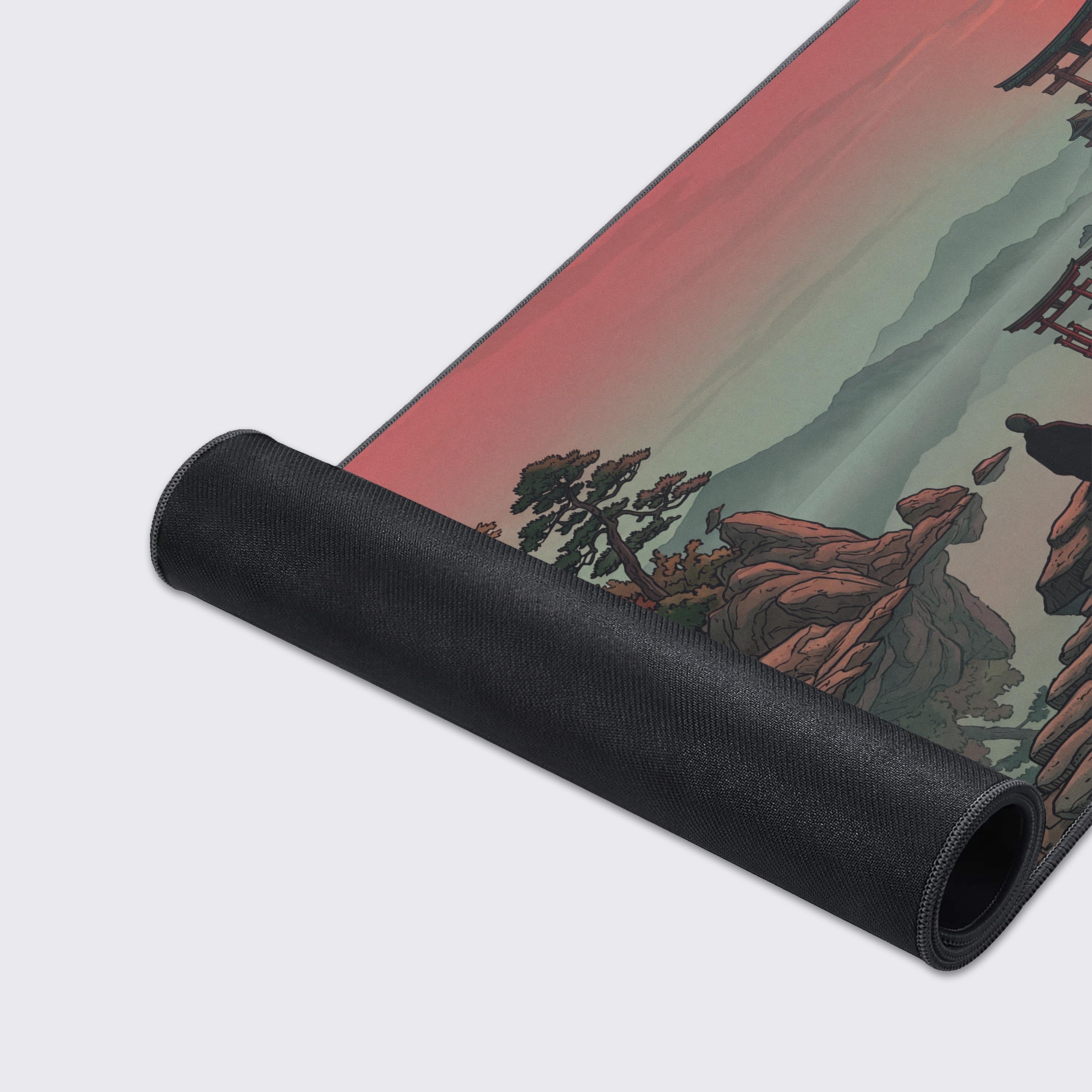 A close-up of the 'Silent Focus' gaming desk mat, highlighting the smooth fabric texture, stitched edges, and the detailed illustration of a meditating monk. - Epic Design Pads & Mousepads