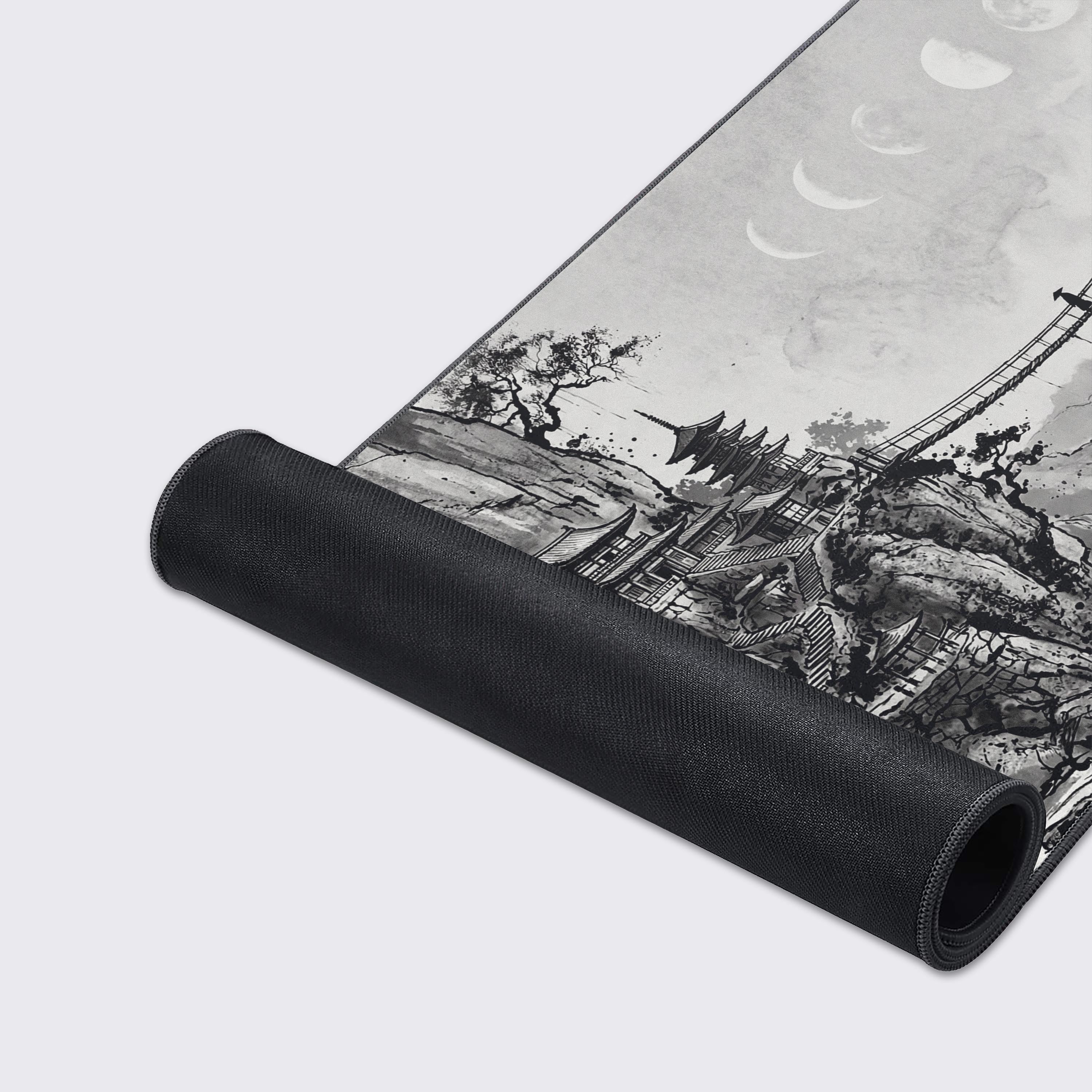 Close-up of the Lunar Passage Mouse Pad's high-quality fabric and stitched edges, showcasing the detailed black and white Japanese mountain temple artwork. - Epic Design Pads & Mousepads